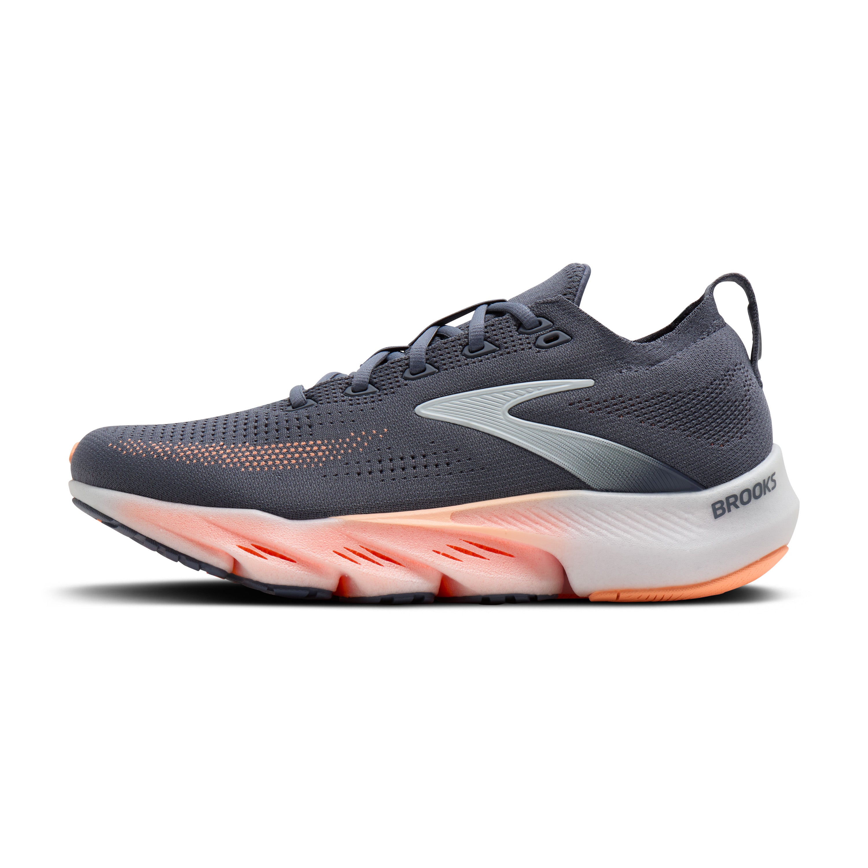 Gray running shoe with pink sole on a white background