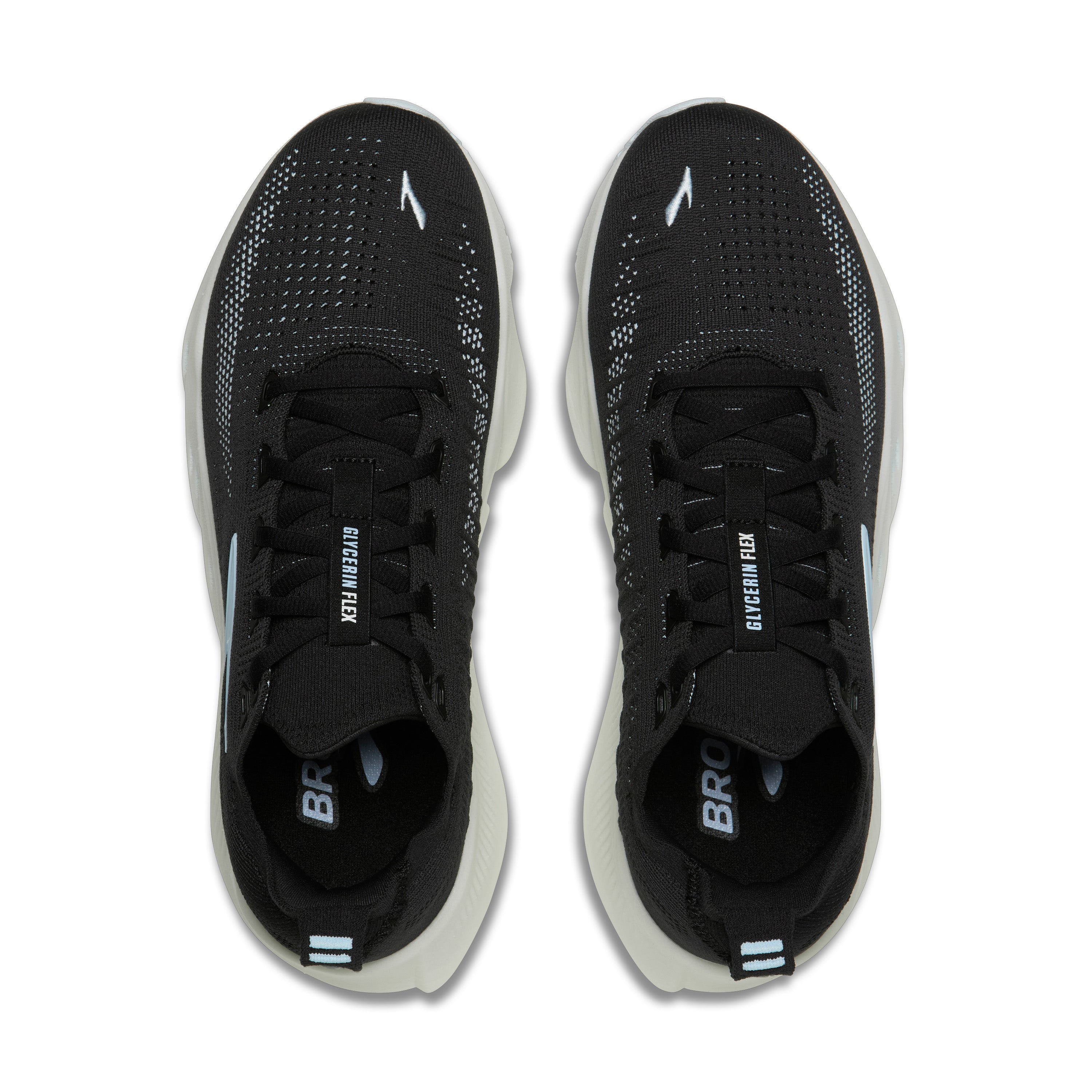 Black running shoes with white soles on a white background
