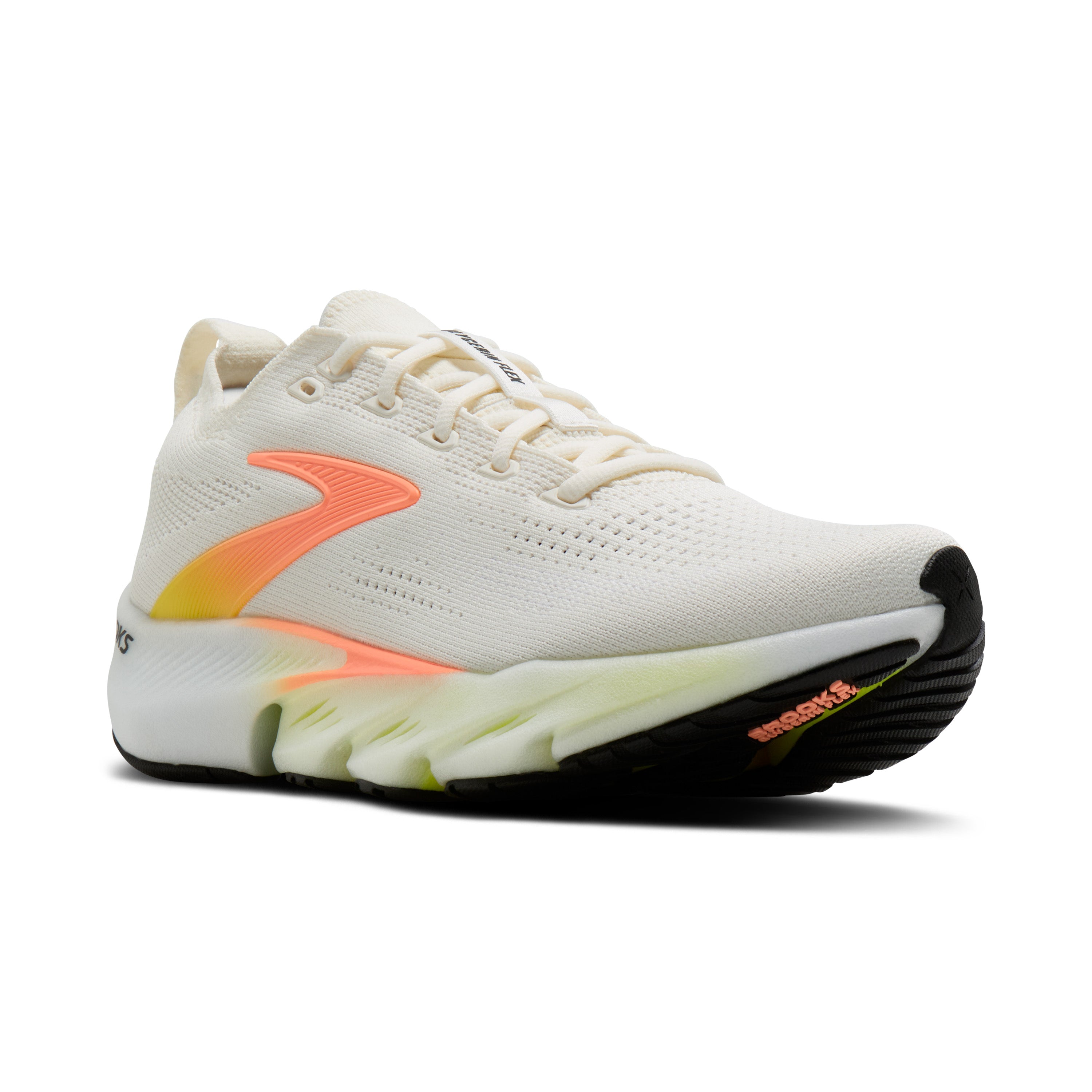 White running shoe with orange accents on a white background