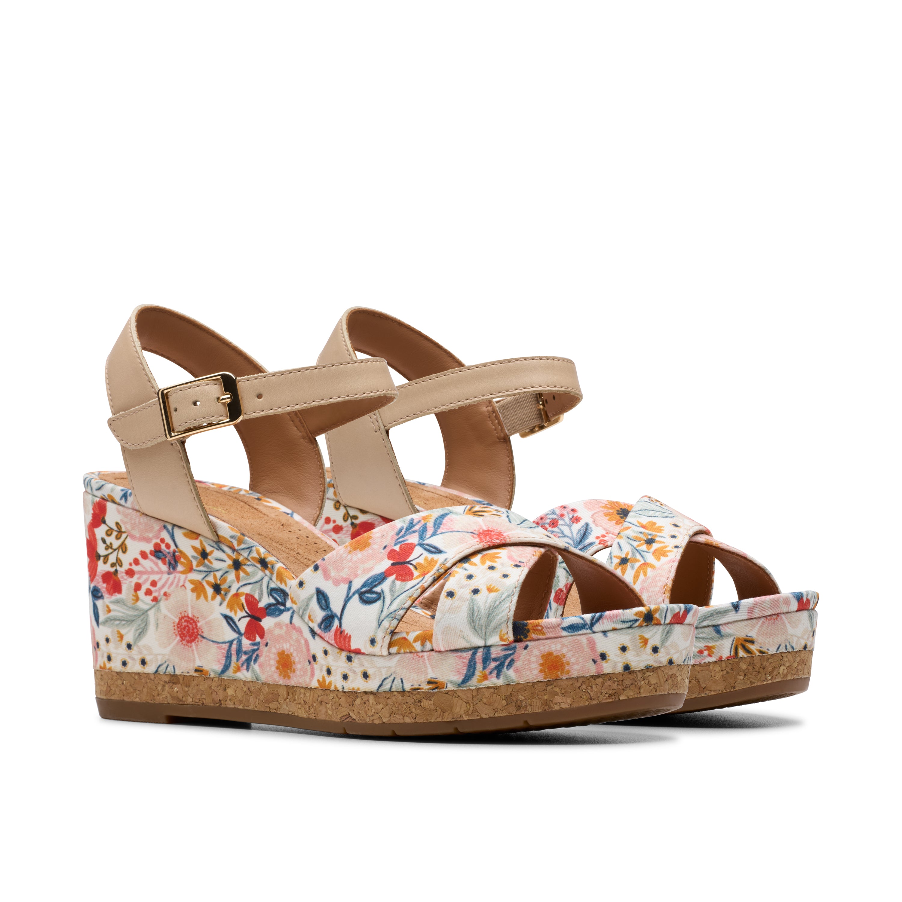 Floral wedge sandals on a white background