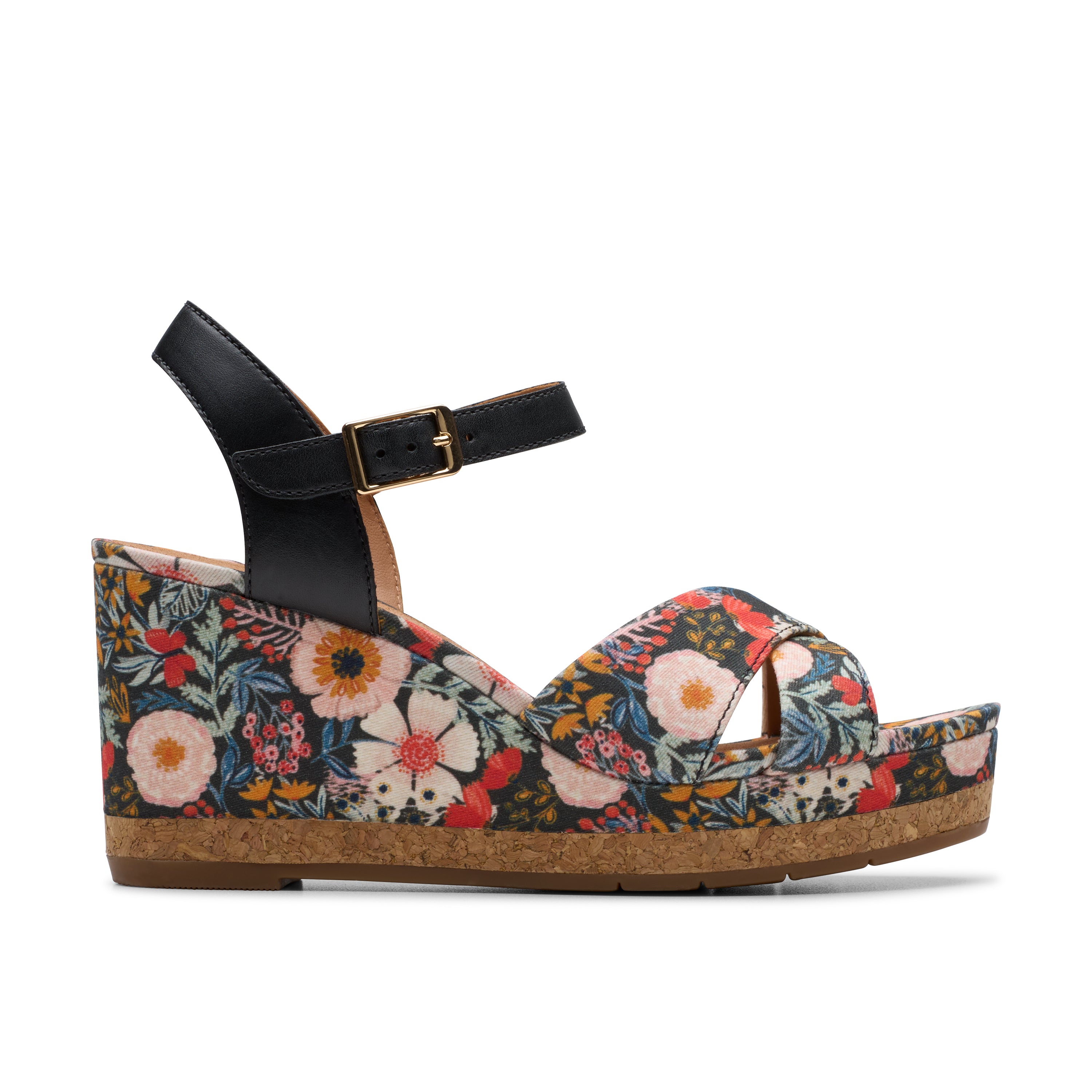 Floral wedge sandal with a black strap on a white background