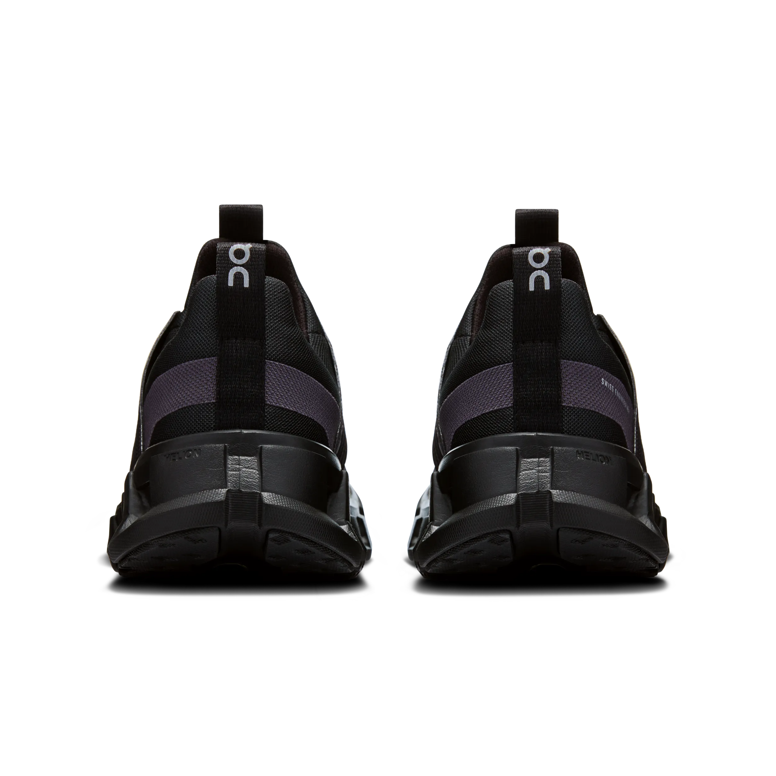 Black athletic shoes with a visible brand logo on a white background
