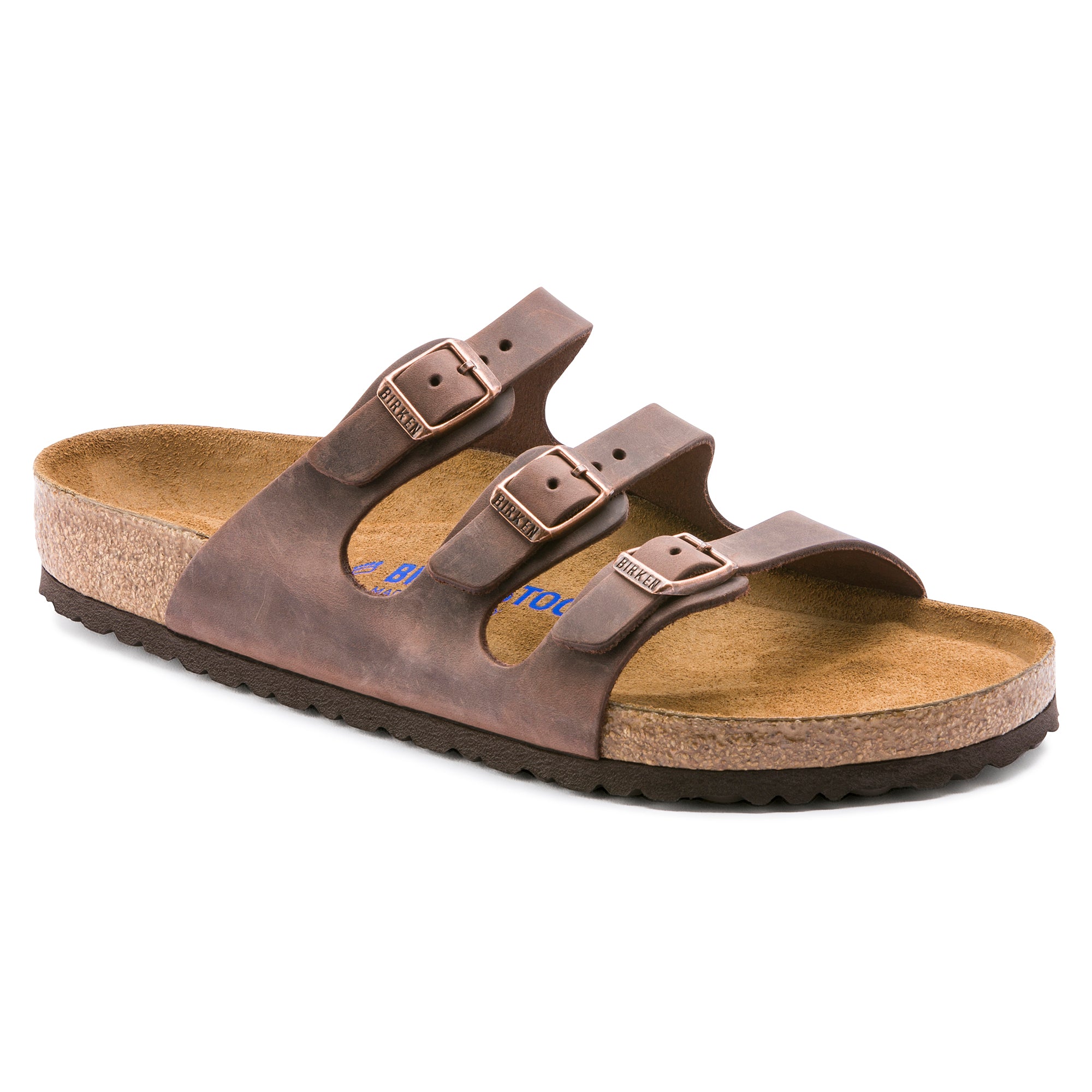 Brown sandal with cork sole on a white background