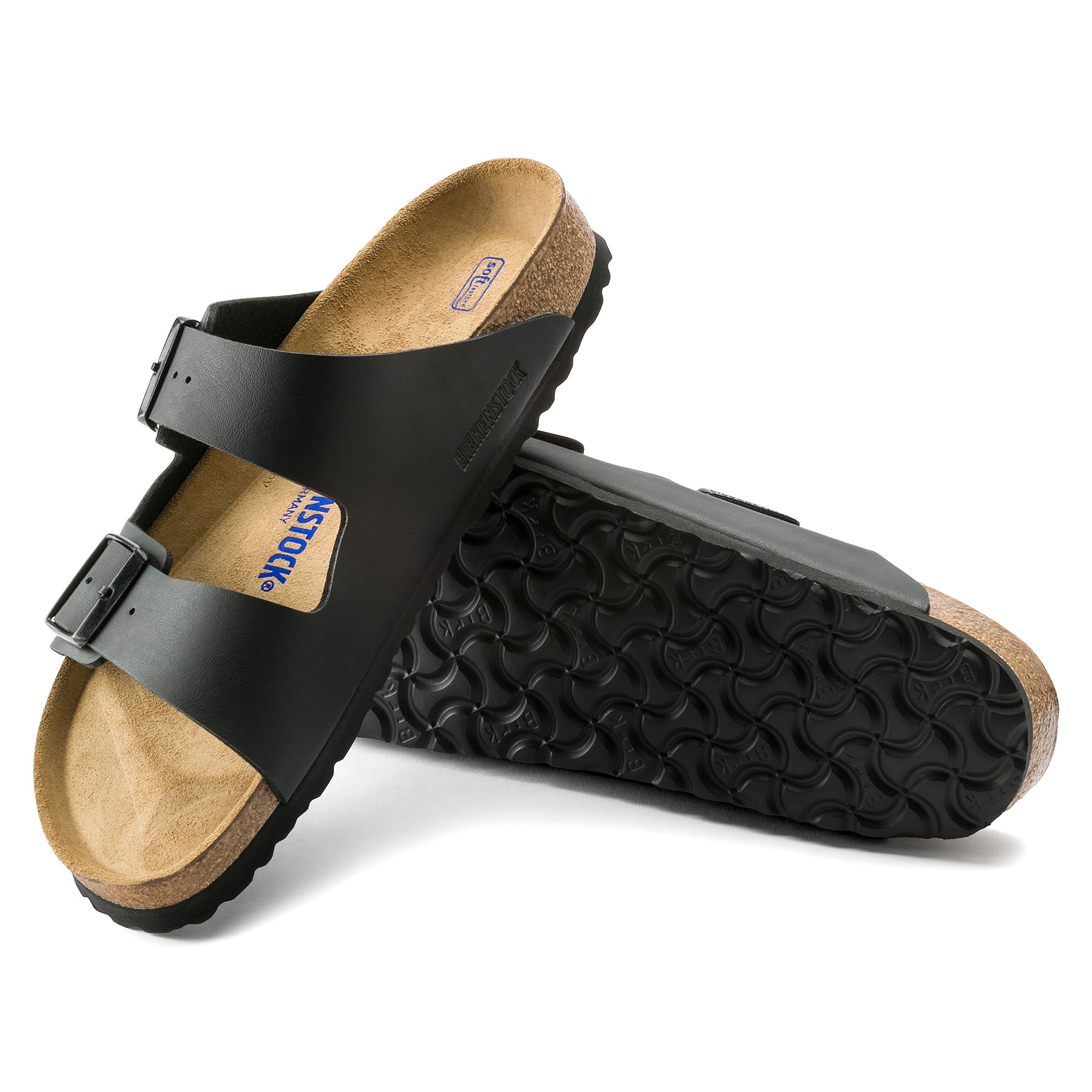 Black sandals with cork insole on a white background