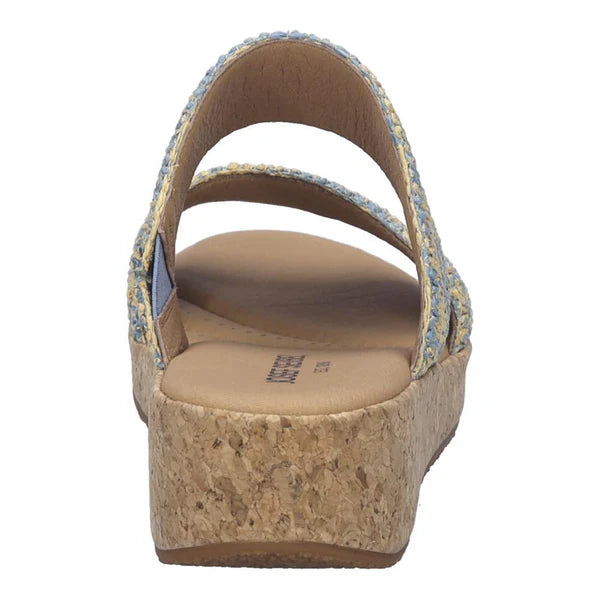 Wedge sandal with cork sole on a white background