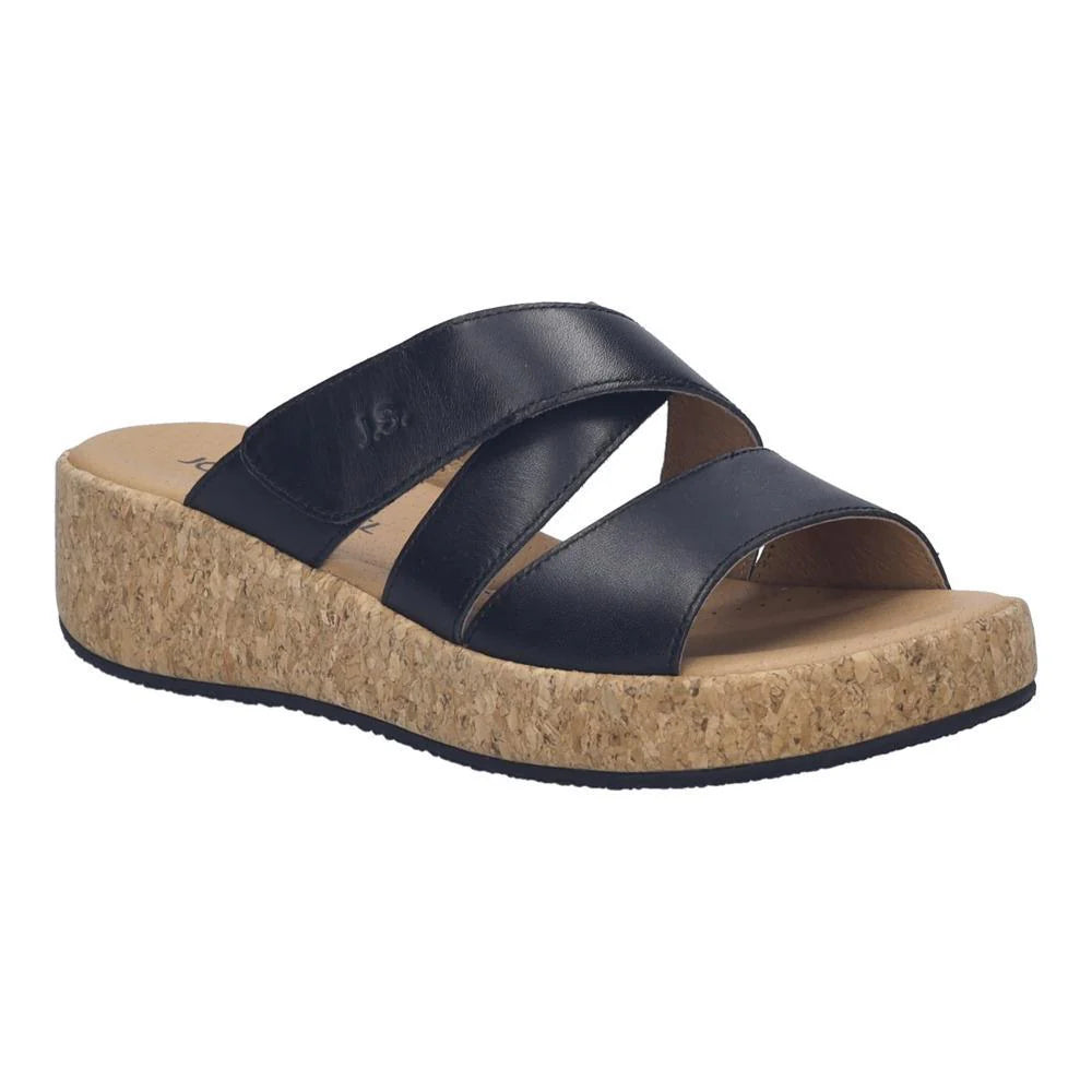 black sandal with cork sole on a white background