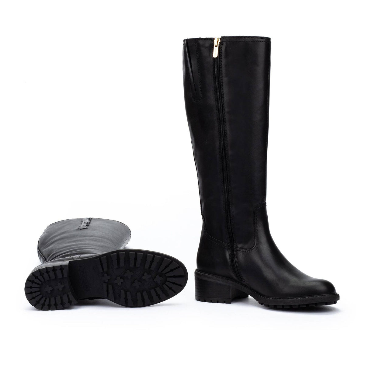 A pair of black knee-high leather boots with side zippers, shown on a white background with one boot standing upright and the other lying on its side to display the sole.