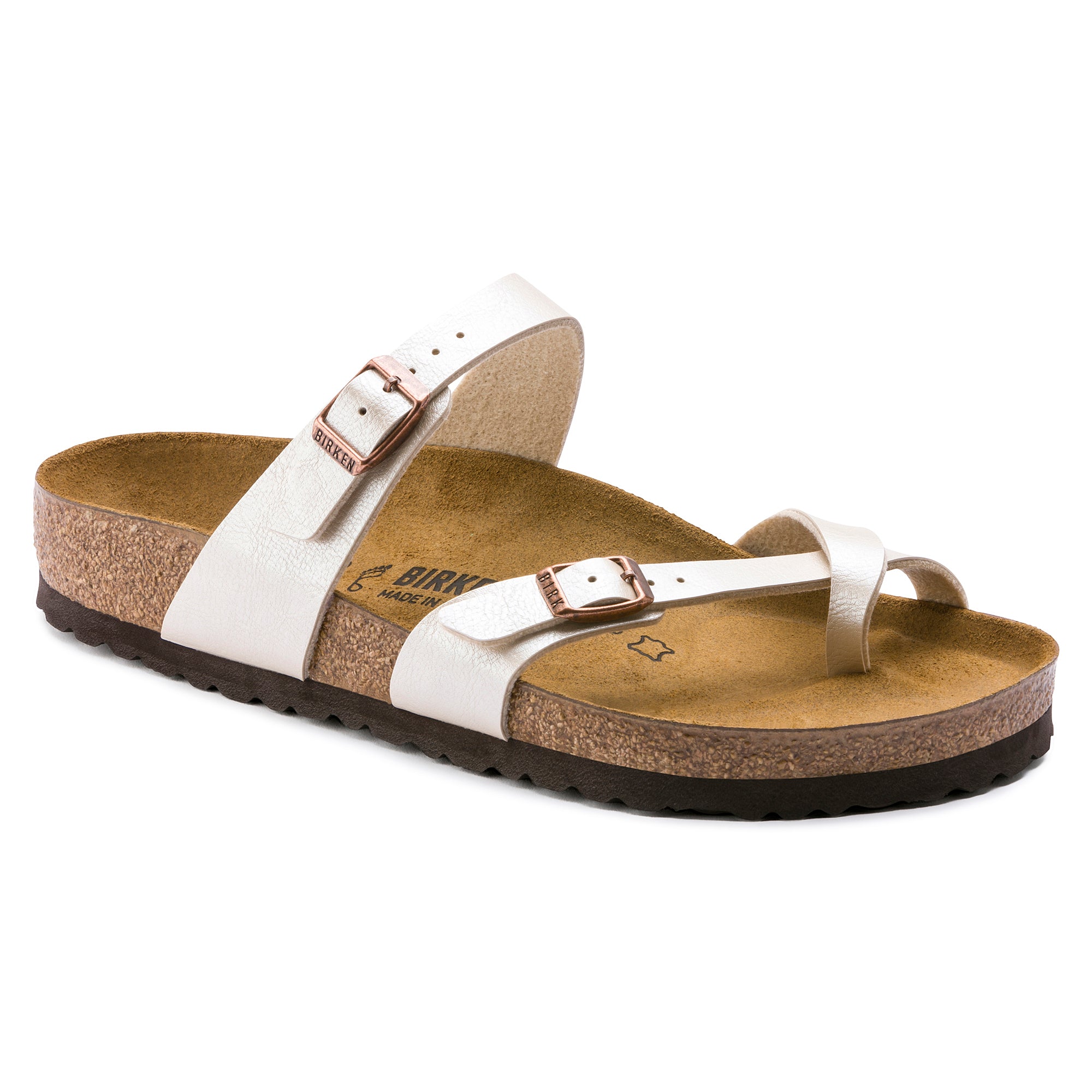 White sandal with cork sole on a white background
