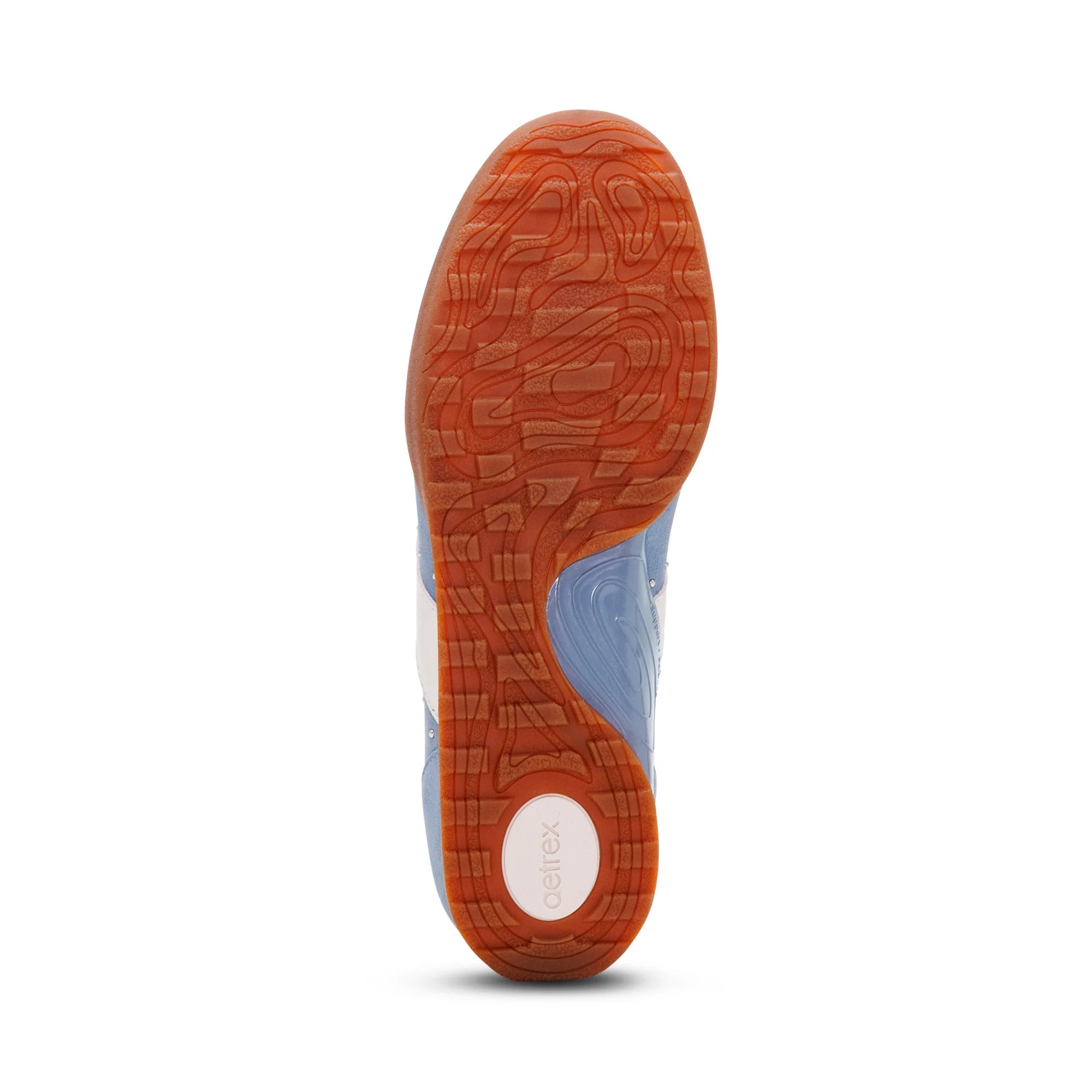 Close-up of a shoe sole with a brand logo on a white background