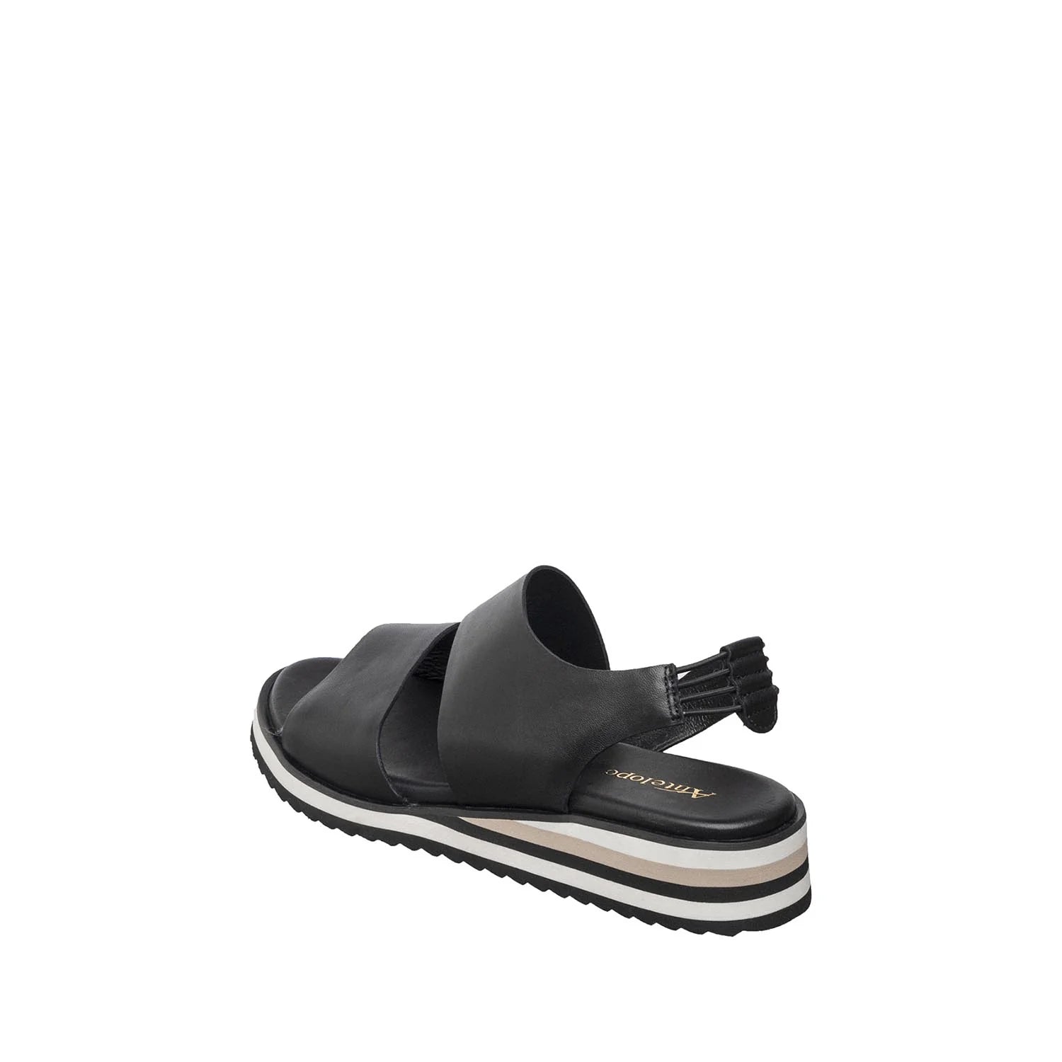 Black sandal with a white sole on a white background