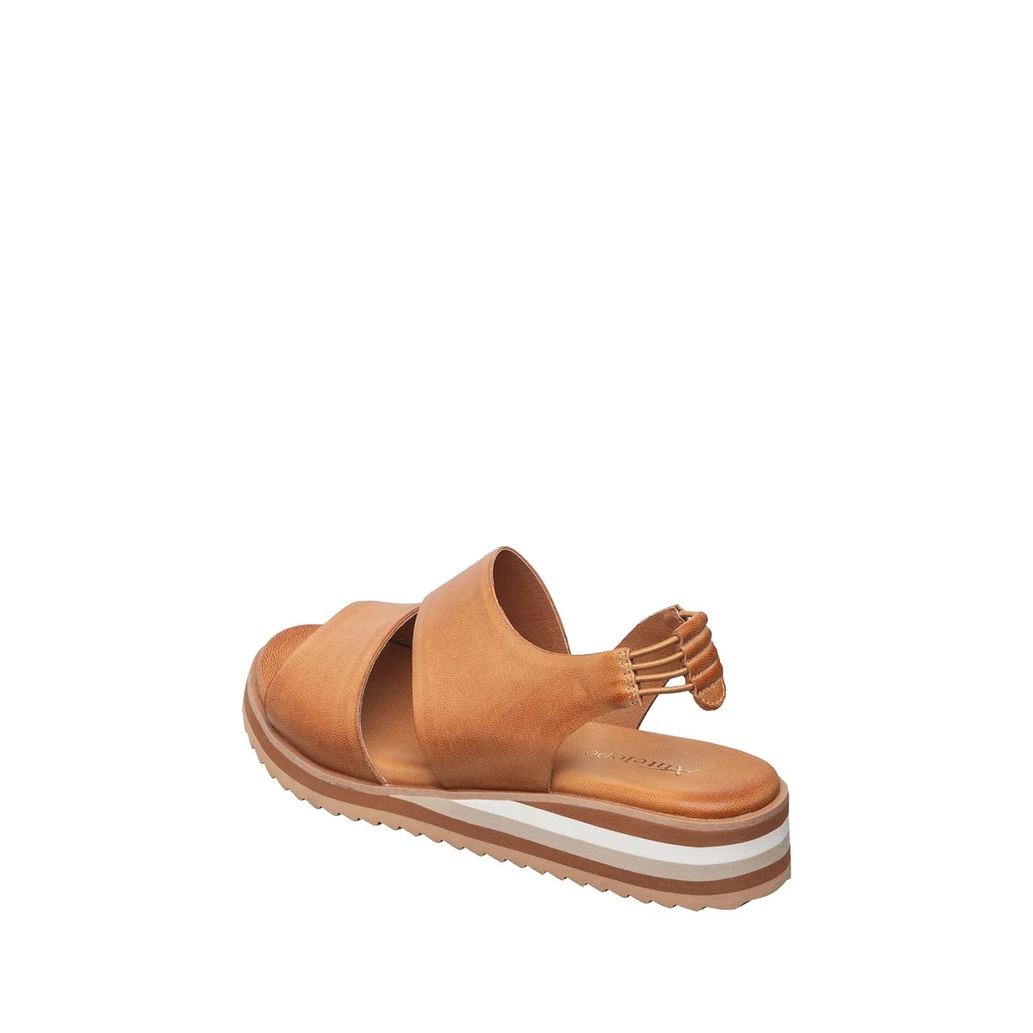Tan sandal with a white sole on a white background