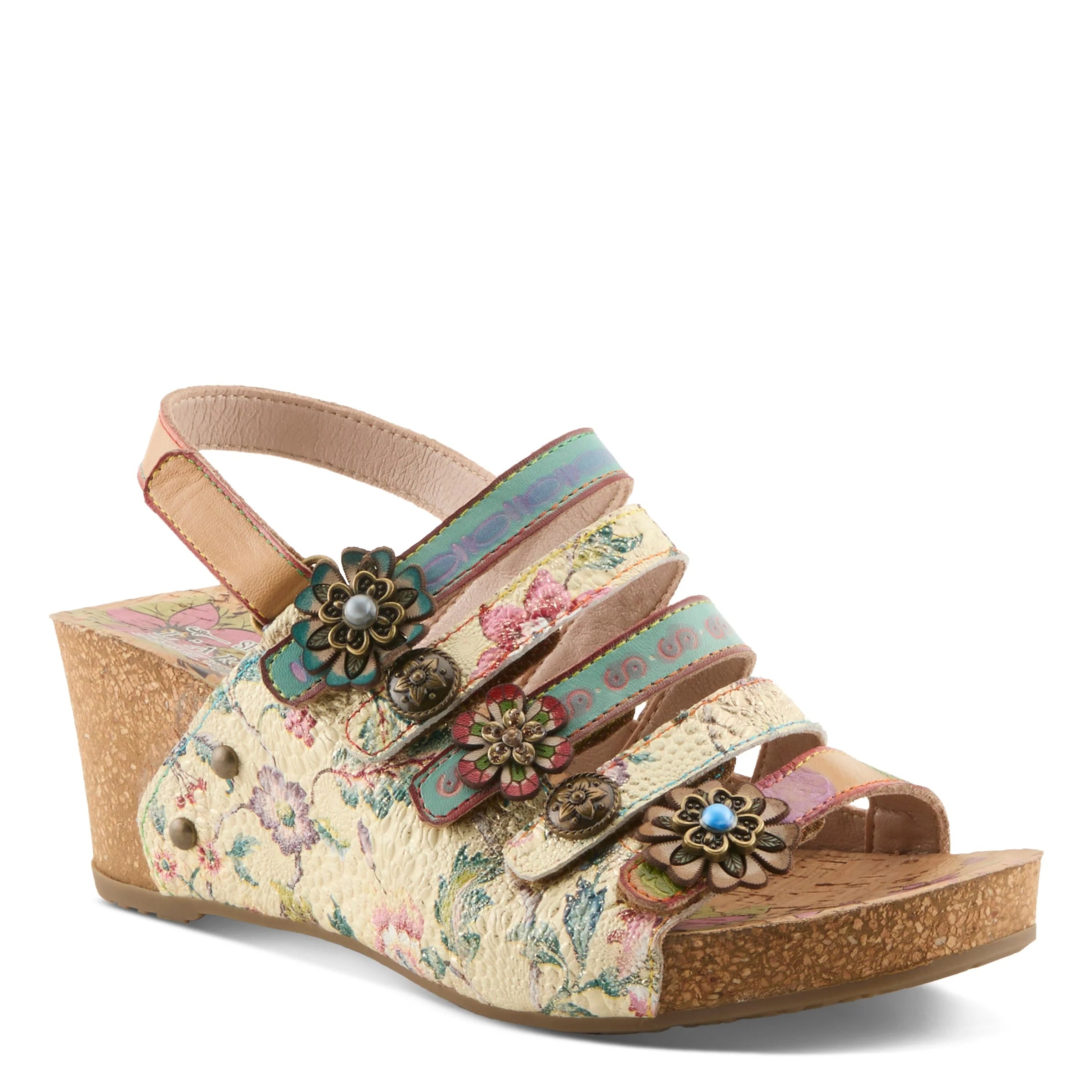Floral wedge sandal with decorative straps and flowers on a white background