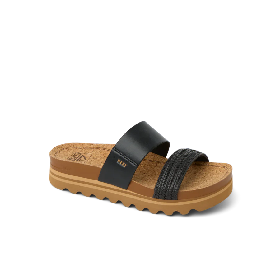 Black sandal with brown sole on a white background