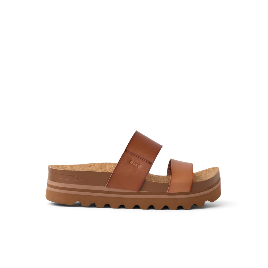 Brown sandal with cork sole on a white background