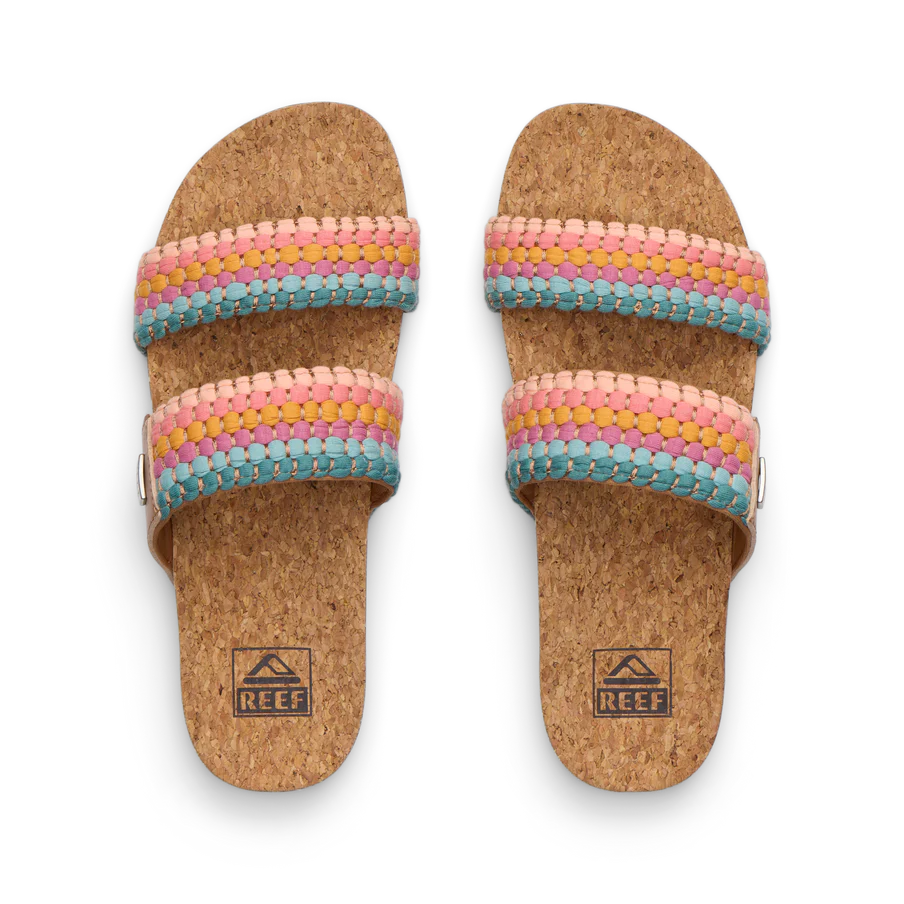 Pair of cork sandals with colorful woven straps on a white background