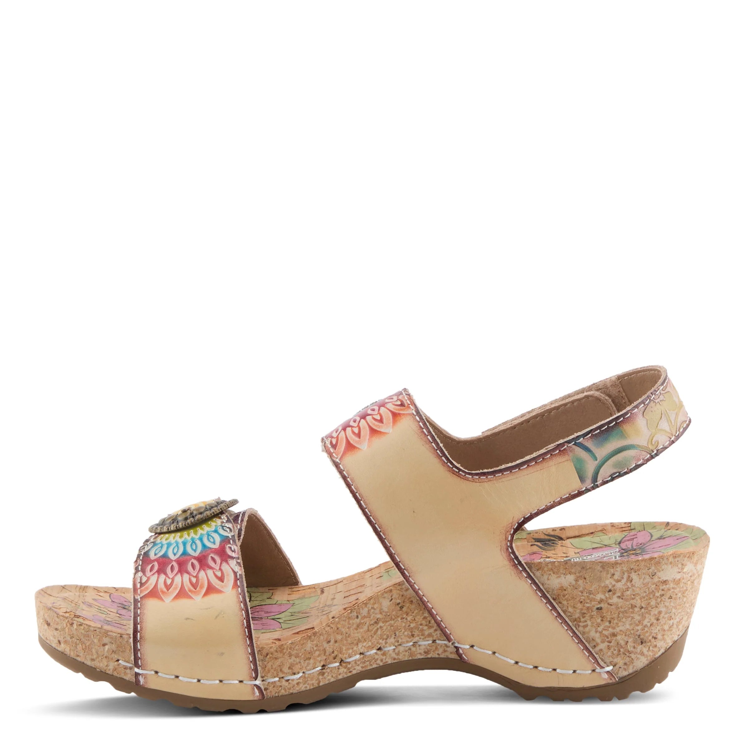 Beige wedge sandal with floral pattern on a white background