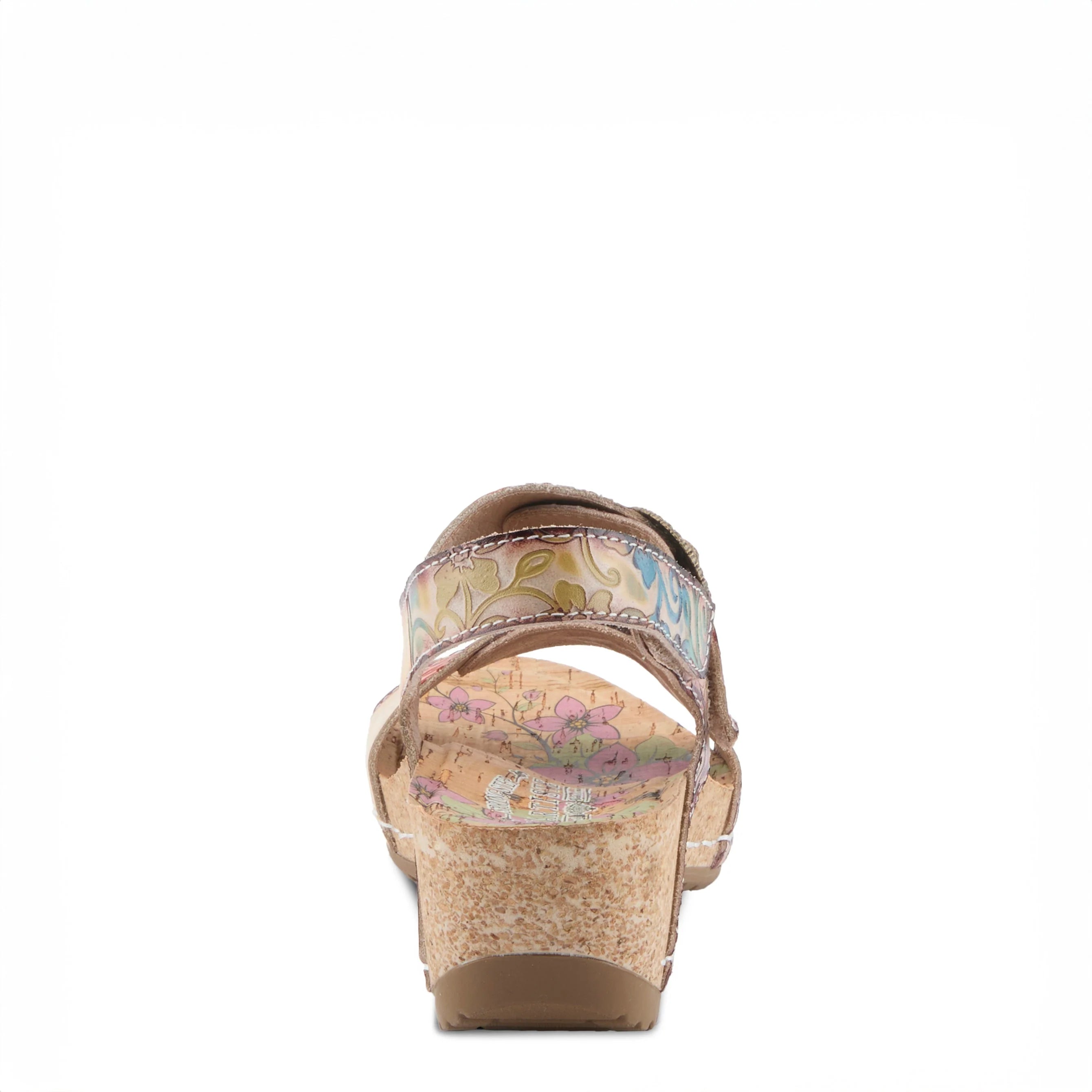 Wedge sandal with floral pattern on a white background