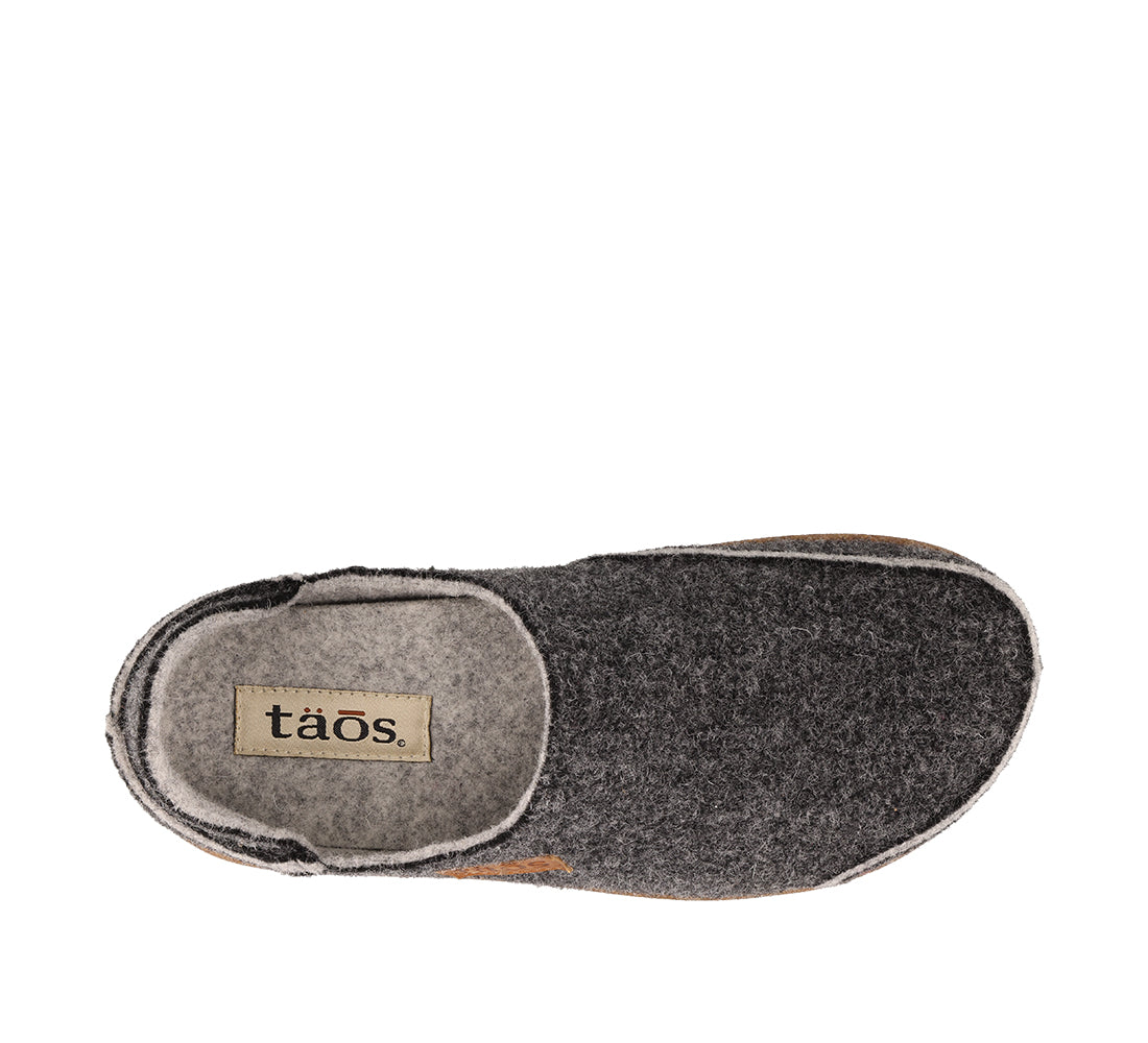 Gray slipper with 'taos' branding on a white background