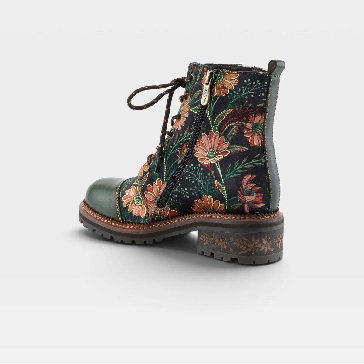 A single lace-up ankle boot with a dark green leather toe cap, black side panel, and a colorful floral print in orange, pink, and green. It features a brown patterned heel and a side zipper.