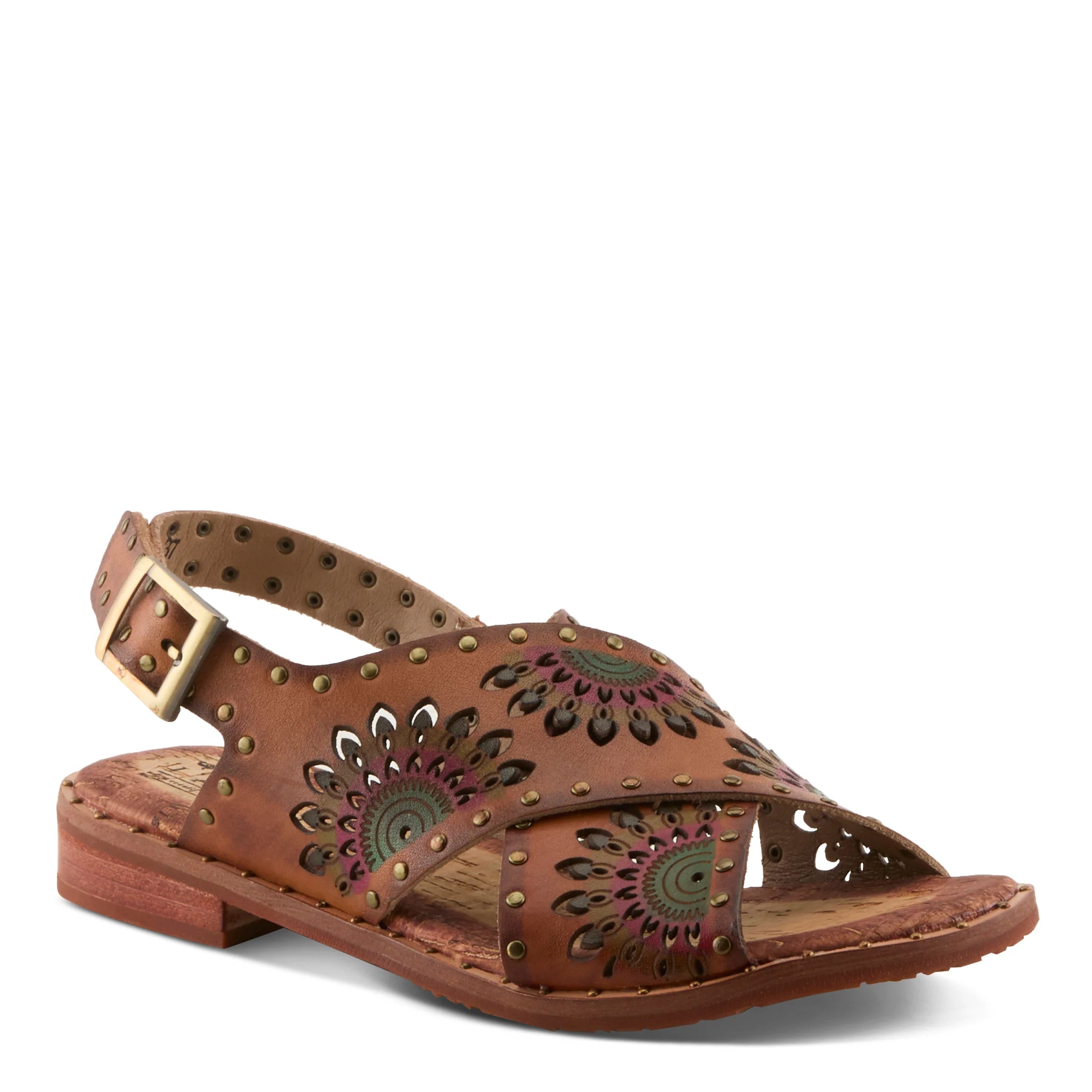 Brown sandal with decorative cut-out design on a white background