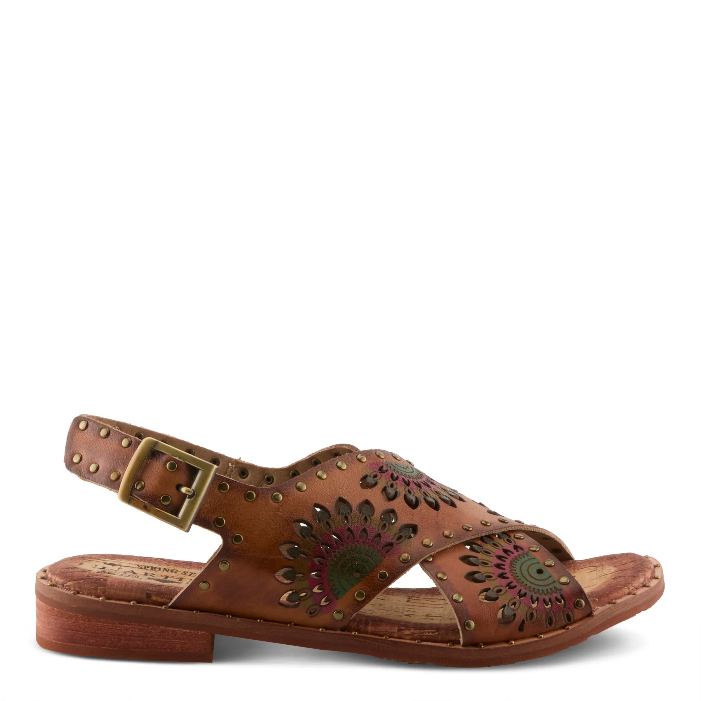 Brown sandal with decorative patterns on a white background