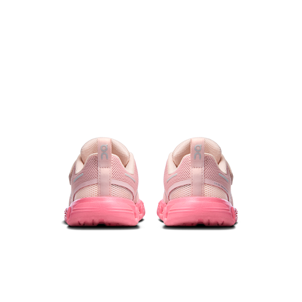 A pair of light pink running shoes shown from the back, featuring a mesh upper and a bright pink sole, set against a plain white background.