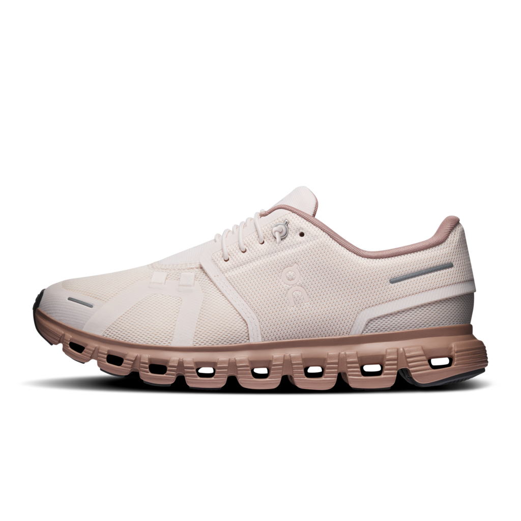 White running shoe with a unique sole design on a white background