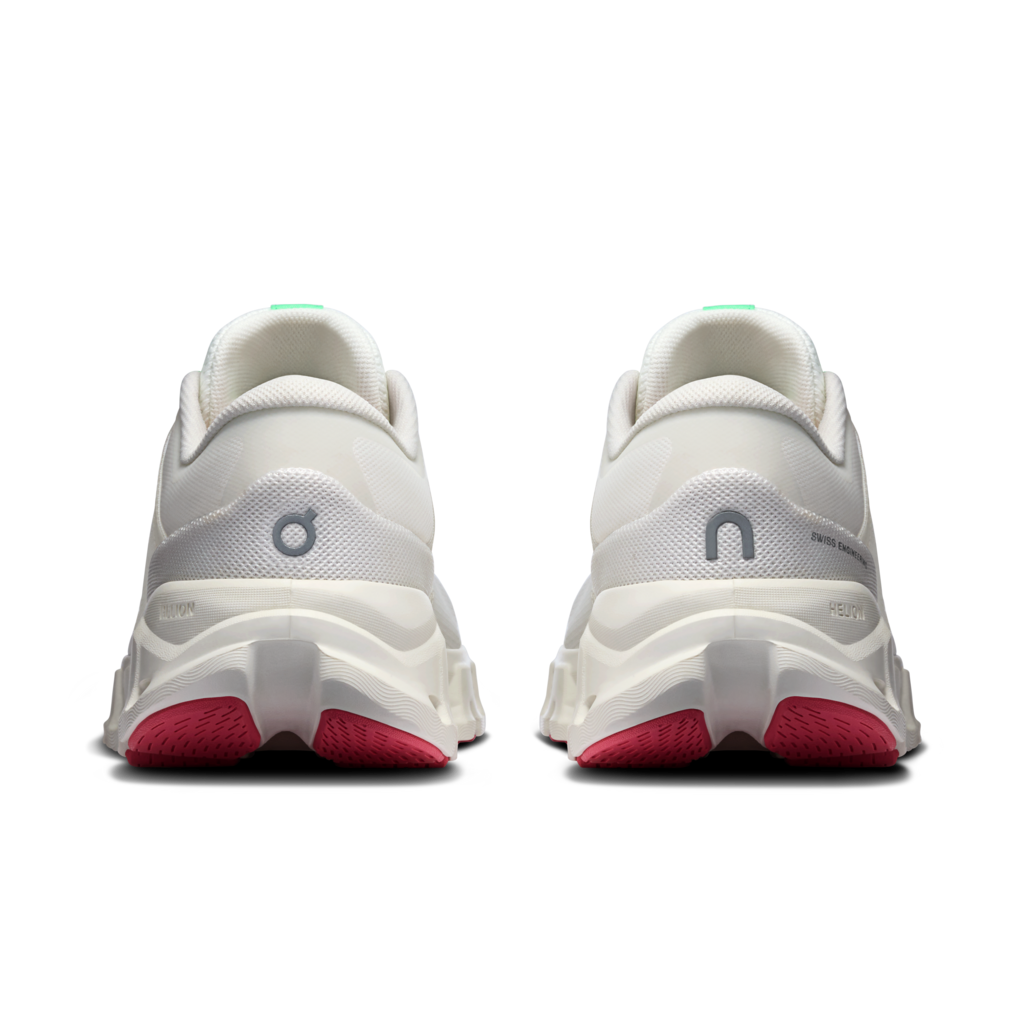 A pair of white On running shoes shown from the rear, featuring a chunky white midsole, a gray 'on' logo, and bright pink outsoles.