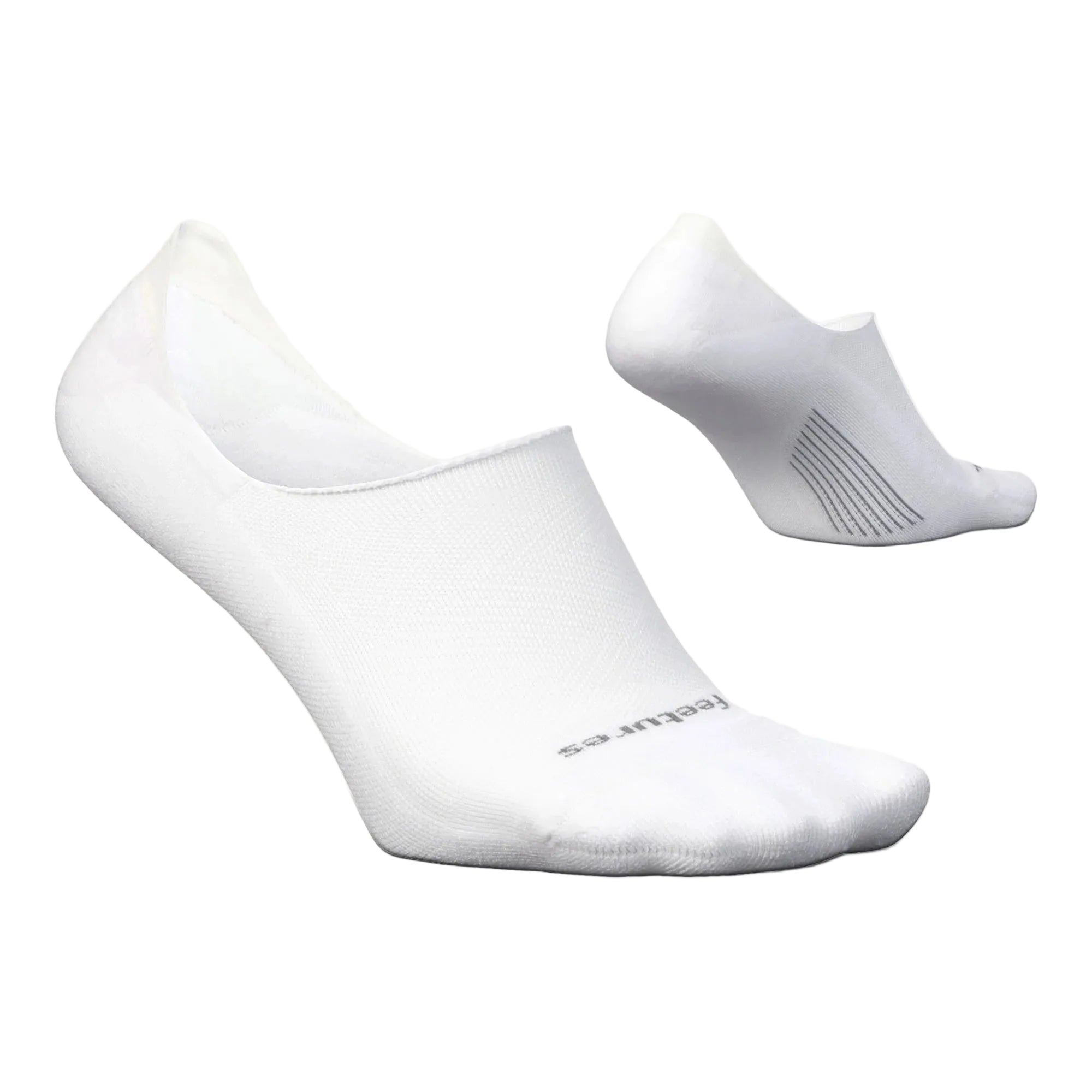 Two white socks on a light gray background