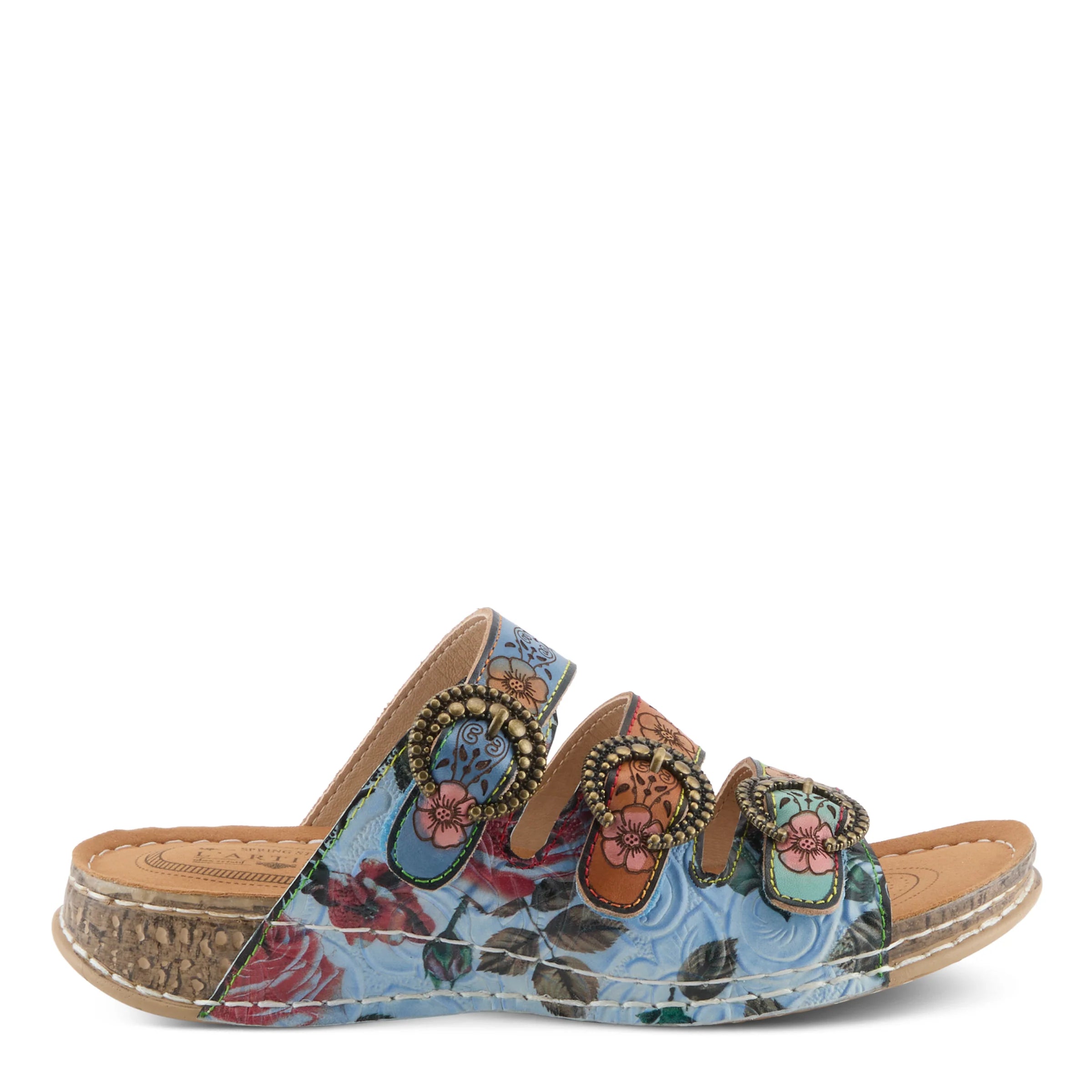 Floral patterned sandal with brown sole on a white background