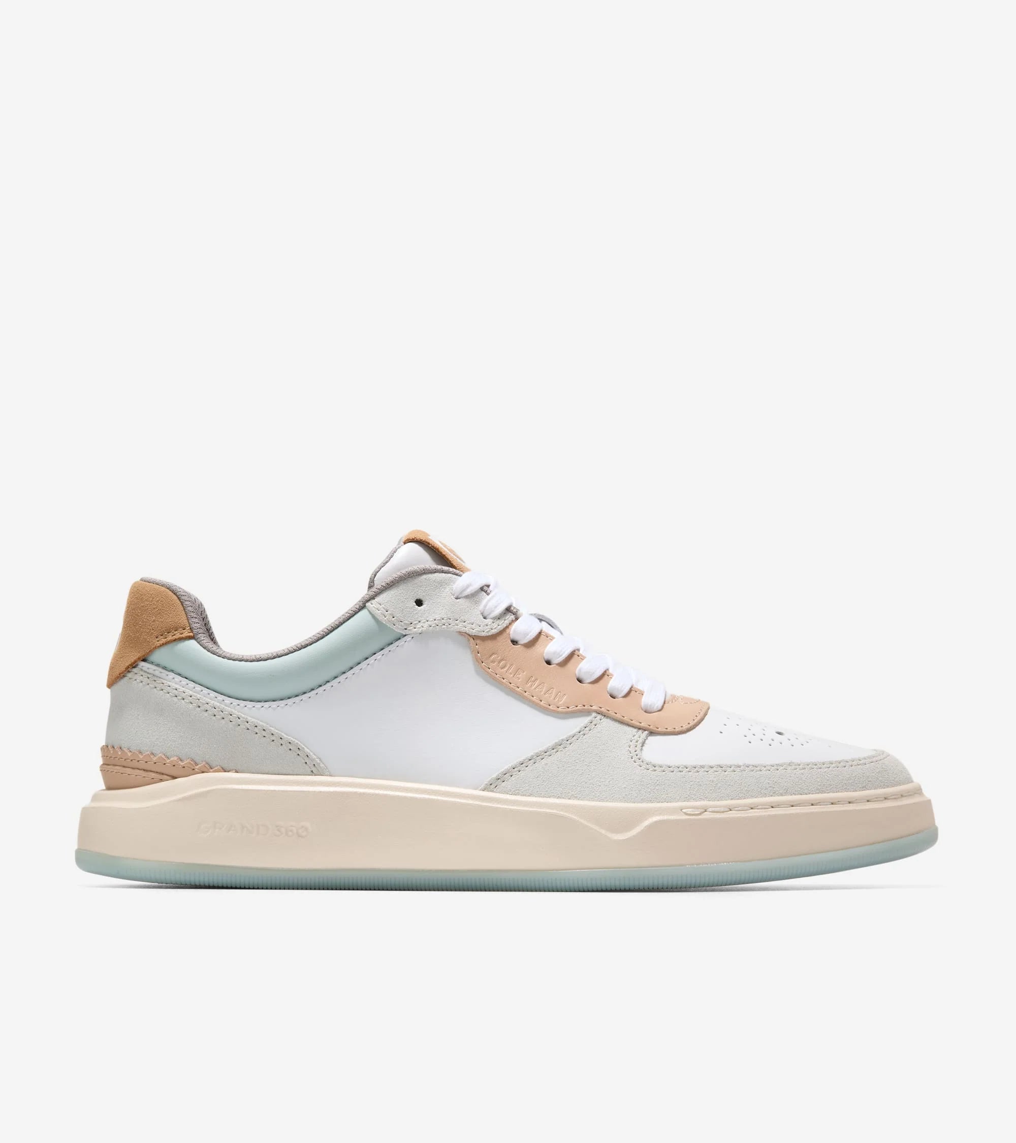 White sneaker with beige and light blue accents on a white background