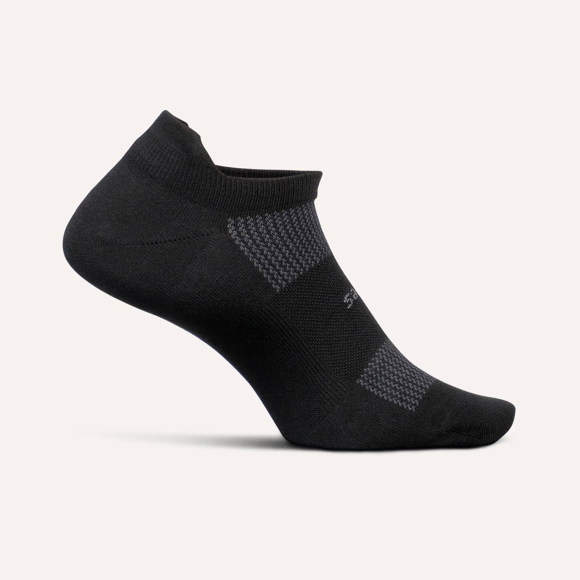 Black ankle sock on a light gray background