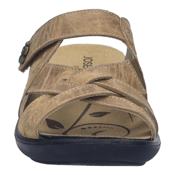 Brown sandal with a visible brand logo on a white background