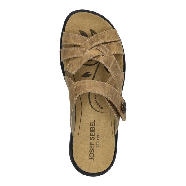 Brown sandal with black sole on a white background