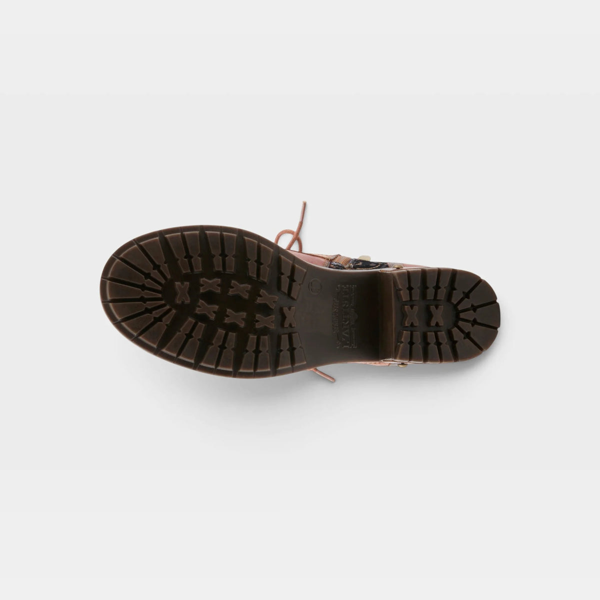 Top-down view of a brown leather boot sole with a textured lug pattern and thin brown laces, shown against a light gray background.