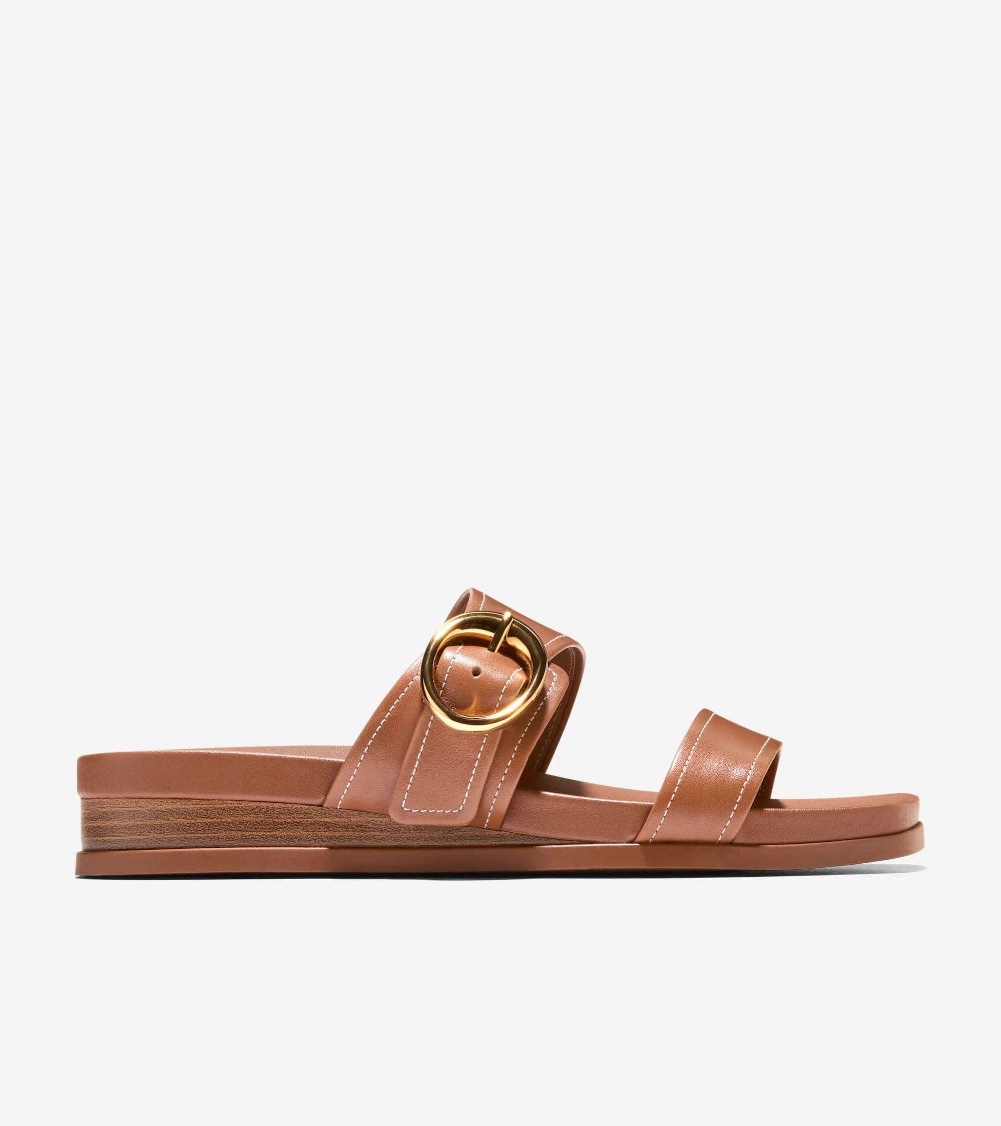 Brown sandal with a gold buckle on a white background