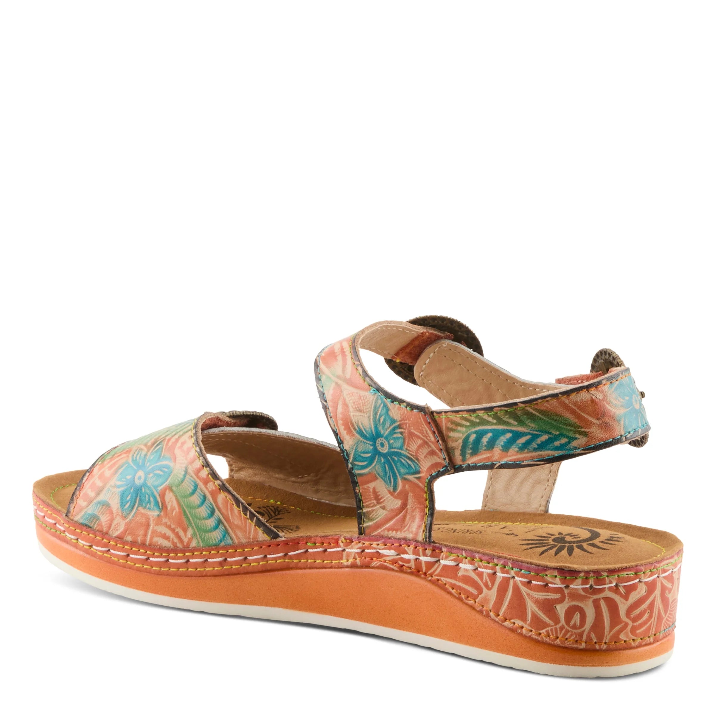 Colorful sandal with floral pattern on an orange sole against a white background