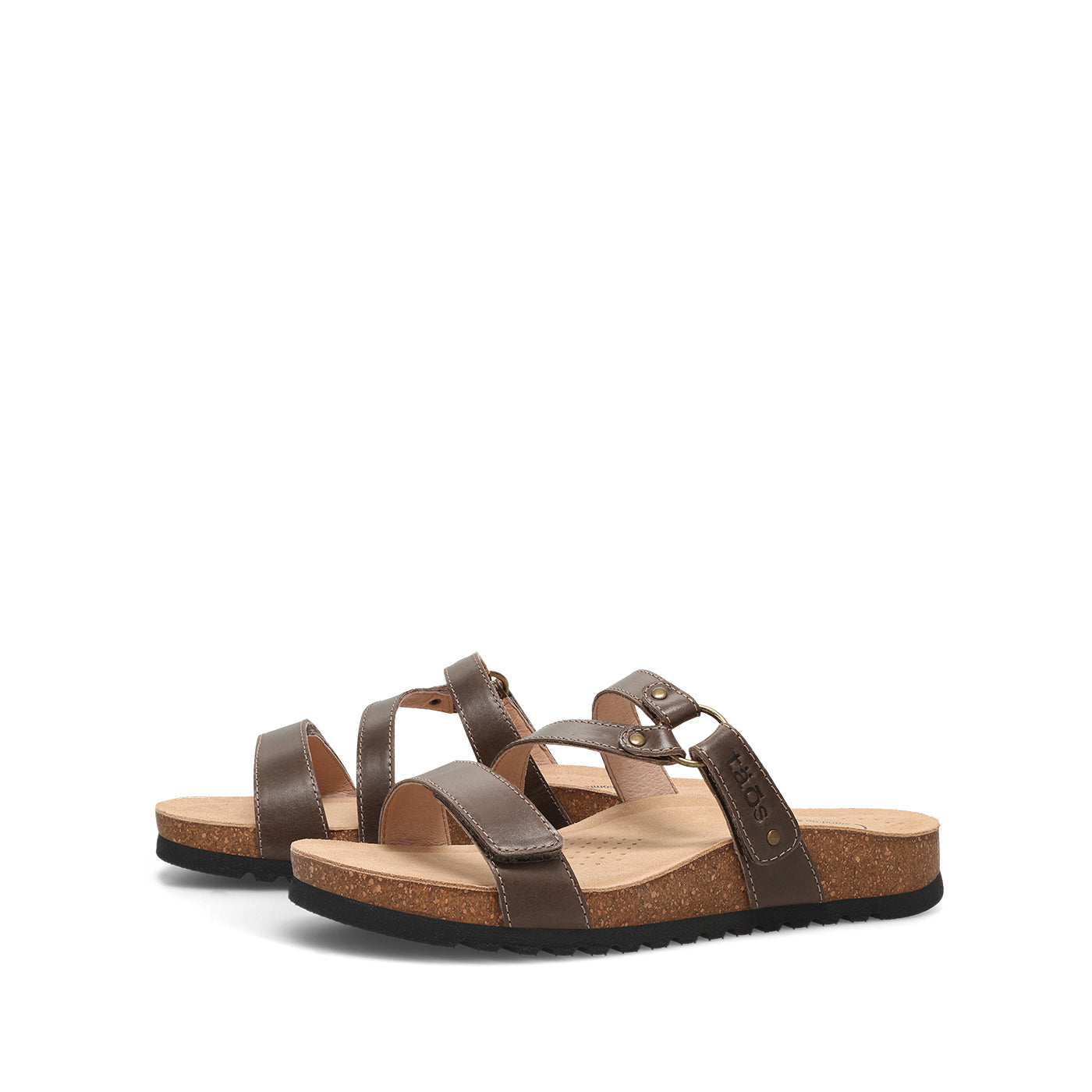 Brown sandals with multiple straps on a white background