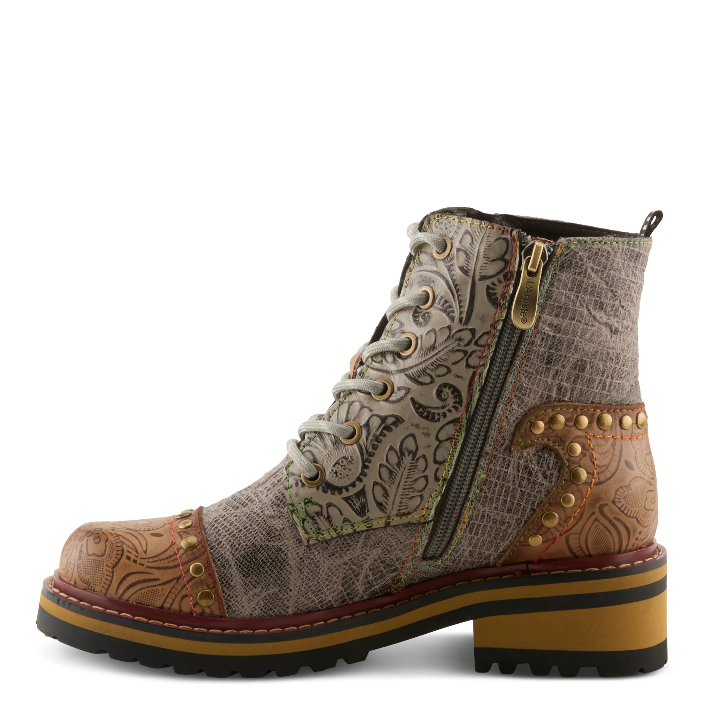 A western-style lace-up ankle boot with a snakeskin-patterned side, tooled leather overlays, brass-tone hardware, and a chunky yellow-brown platform sole on a white background.
