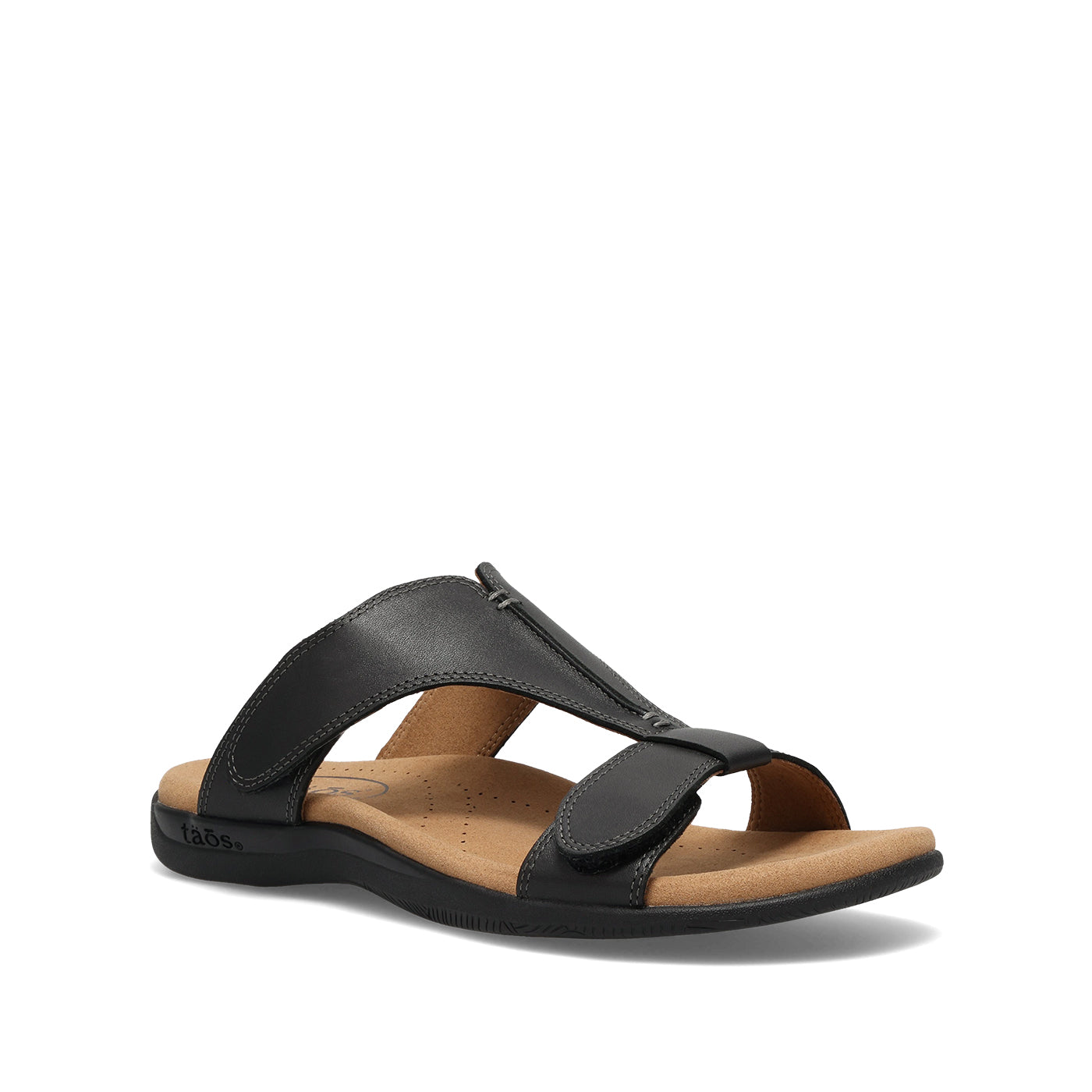 Black sandal with a tan insole on a white background