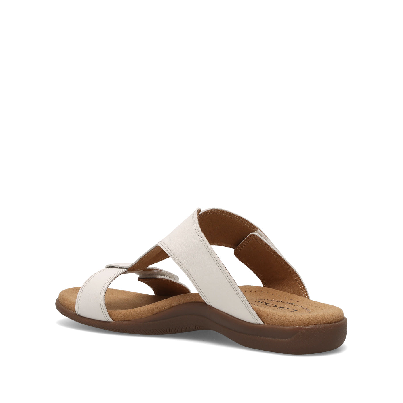 White sandal with brown sole on a white background