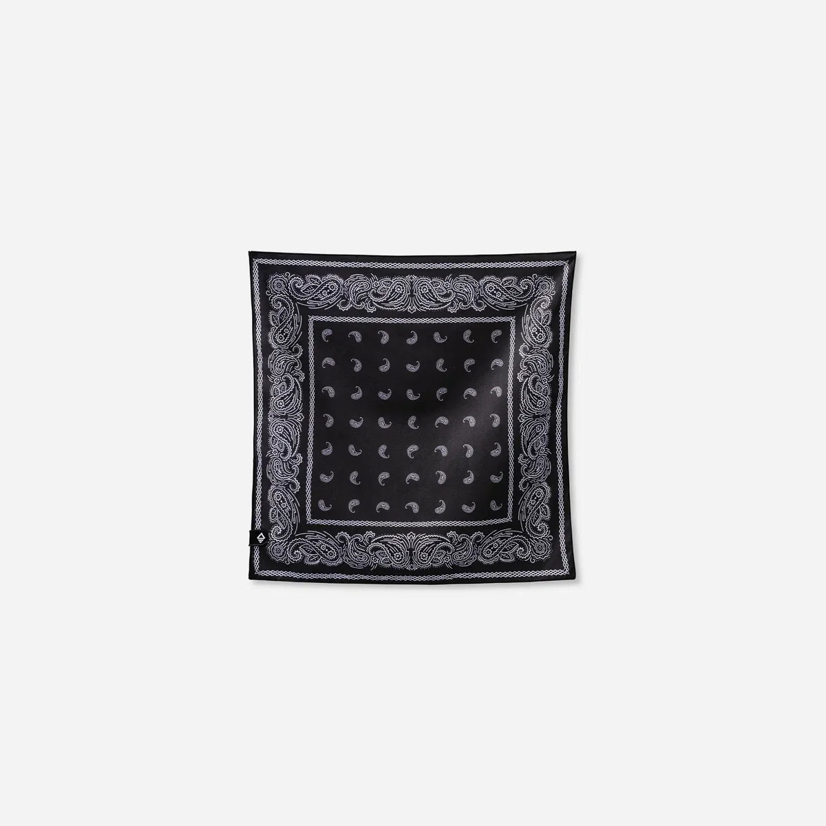 Black bandana with white patterns on a light gray background