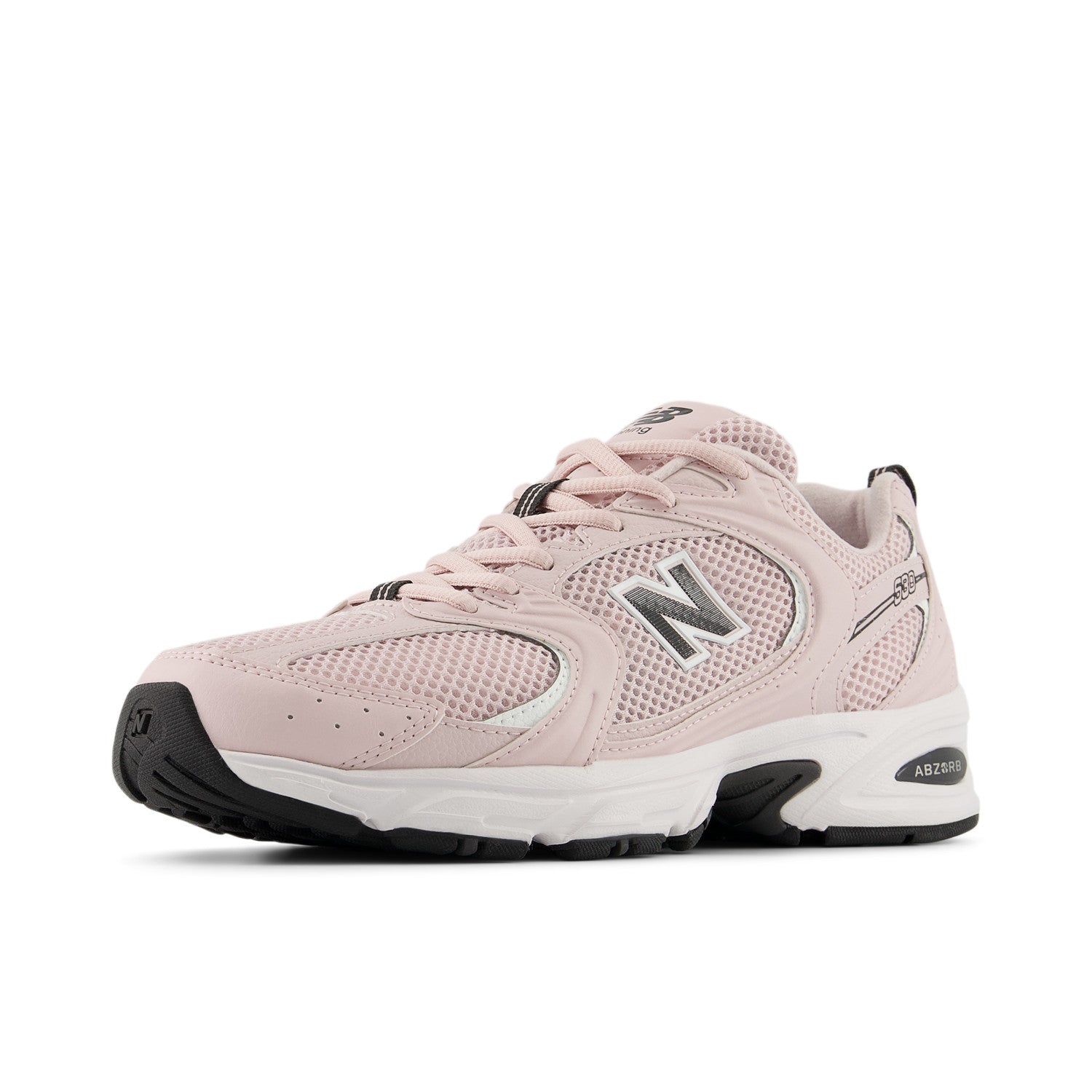 Pink sneaker with black sole on a white background