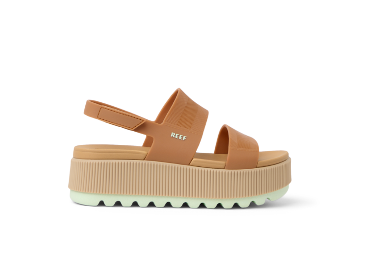 Brown platform sandal with 'REEF' branding on a white background