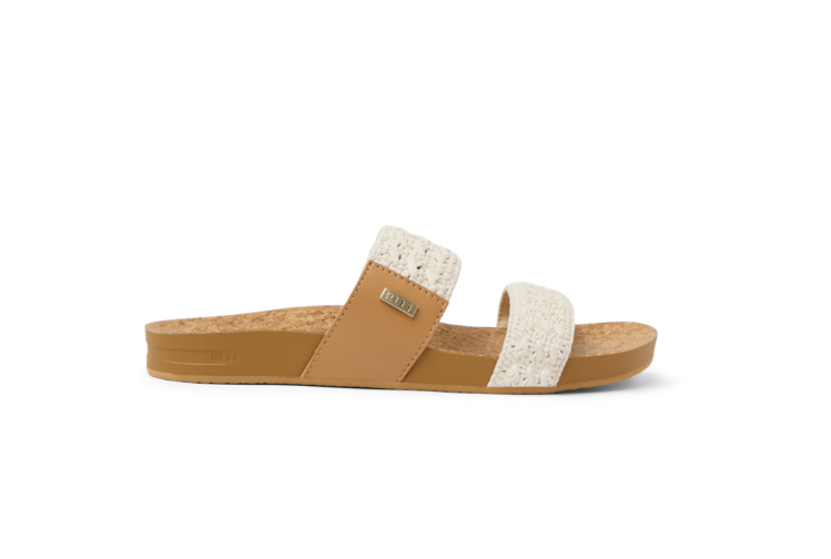 Tan sandal with white textured straps on a white background