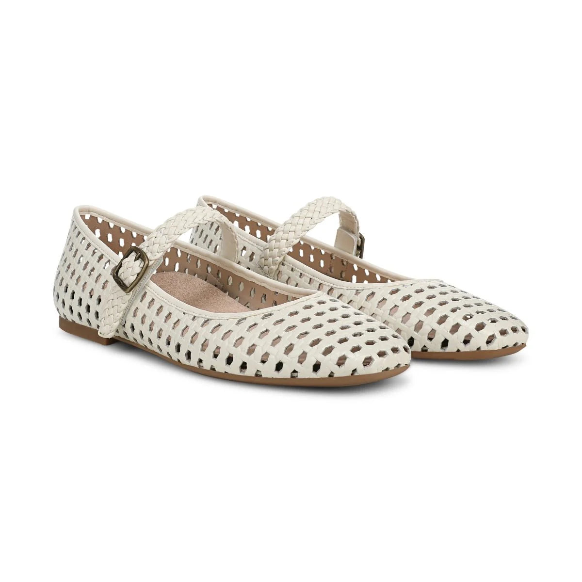 Pair of cream-colored perforated flats with a strap on a white background