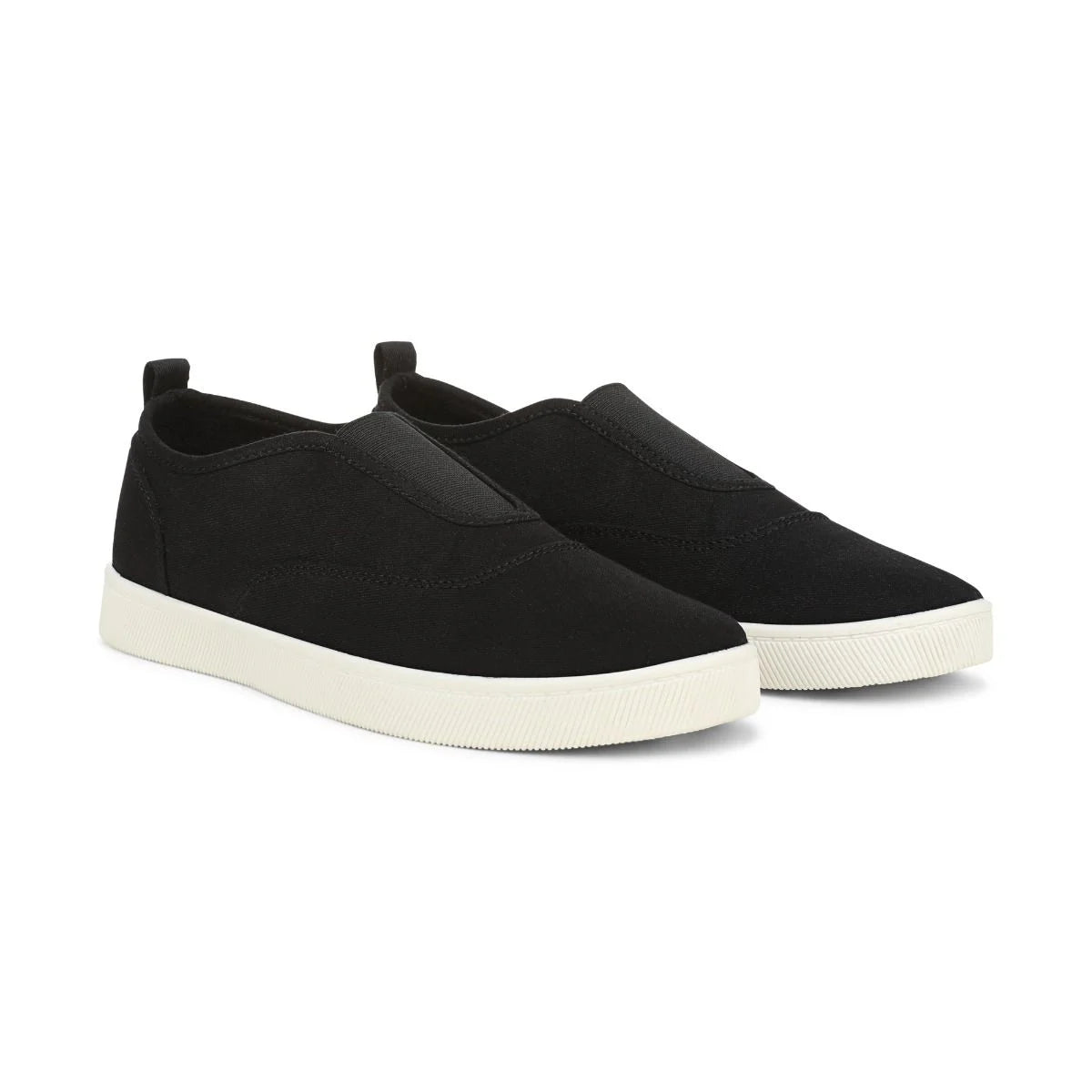 Black slip-on sneakers with white soles on a white background