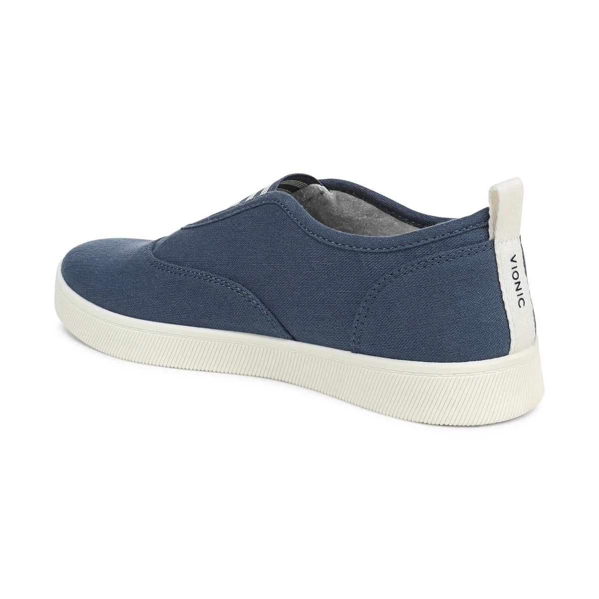 Blue casual shoe with white sole on a white background