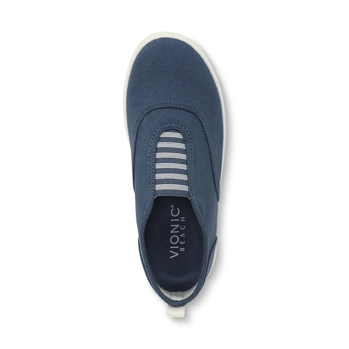 Blue slip-on shoe with white sole on a white background