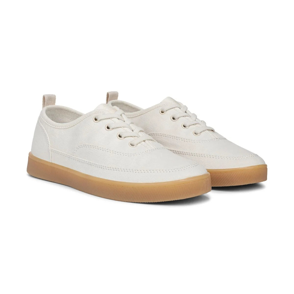White sneakers with brown soles on a white background
